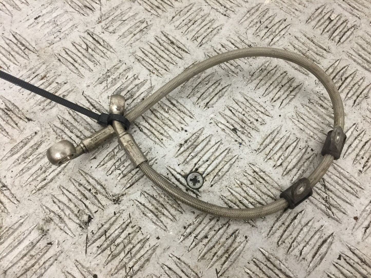 TRIUMPH 675 DAYTONA REAR BRAKE LINE YEAR 2006-2008 (STOCK 789)