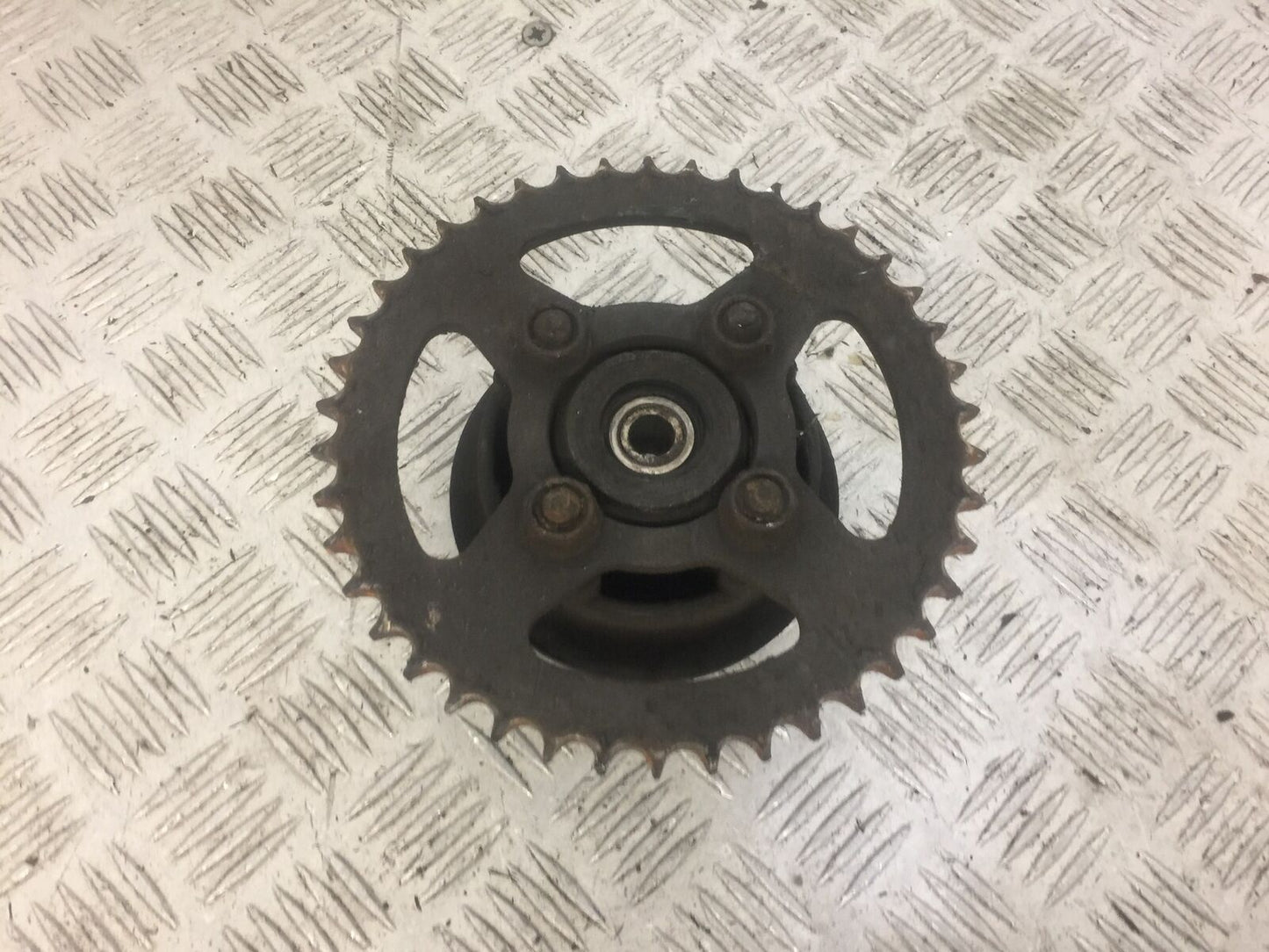 HONDA CBR125 CBR 125 REAR SPROCKET CARRIER YEAR 2008 (STOCK 627)