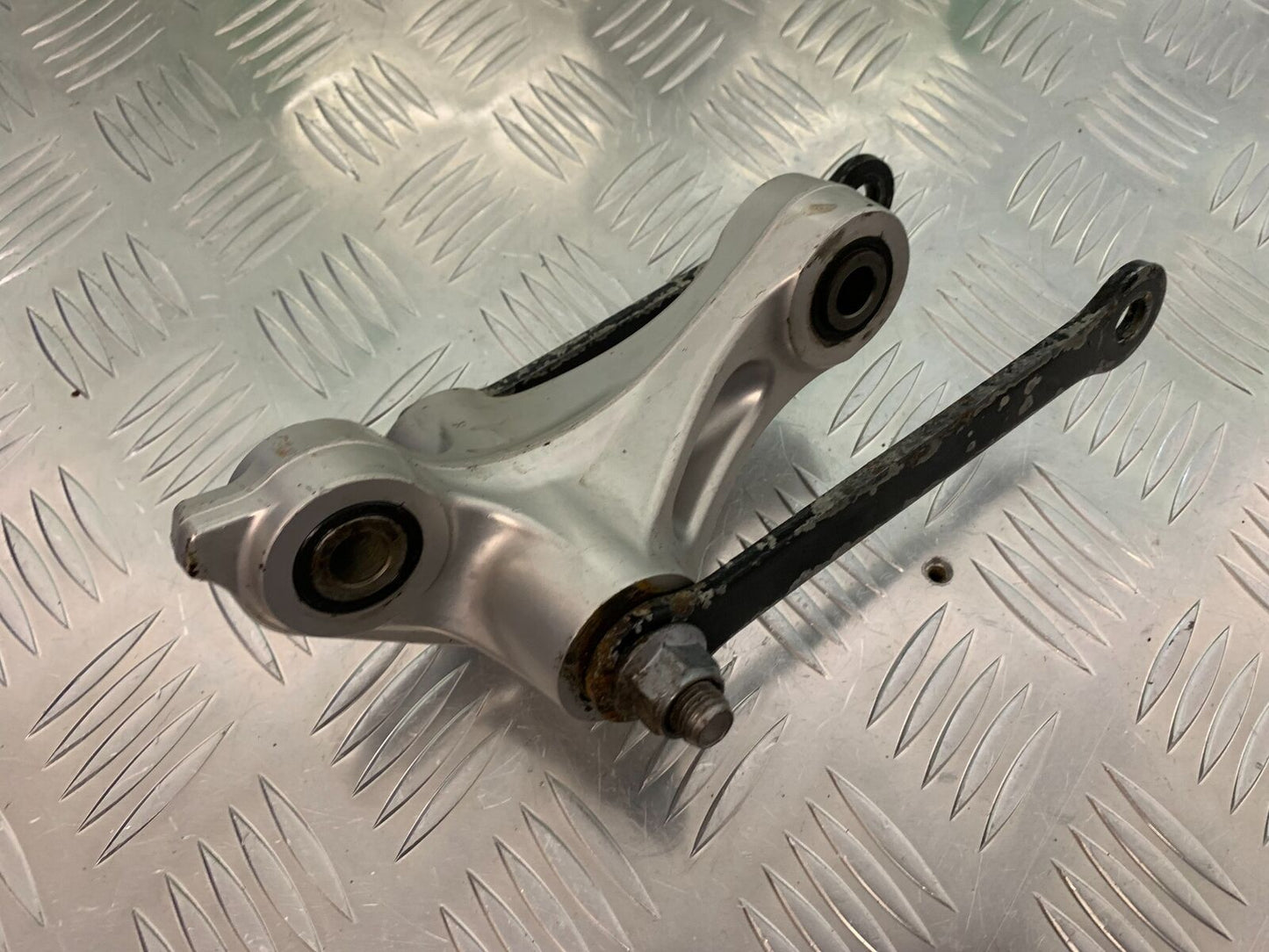 TRIUMPH TIGER 800 XCA REAR SHOCK LINKAGE YEAR 2015-2017 (STOCK 940)