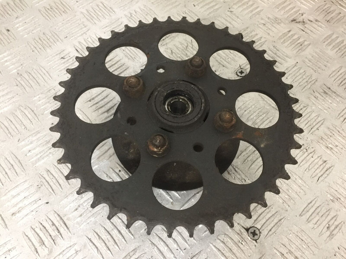 HONDA XL125 VARADERO REAR SPROCKET CARRIER YEAR 2001-04 (STOCK 854)