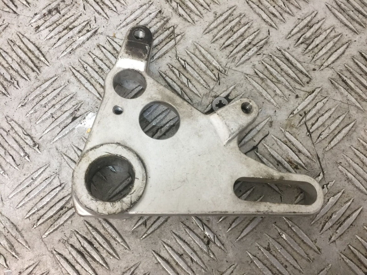 APRILIA TUONO 1000 REAR CALIPER BRACKET YEAR 2003-2004 (STOCK 767)