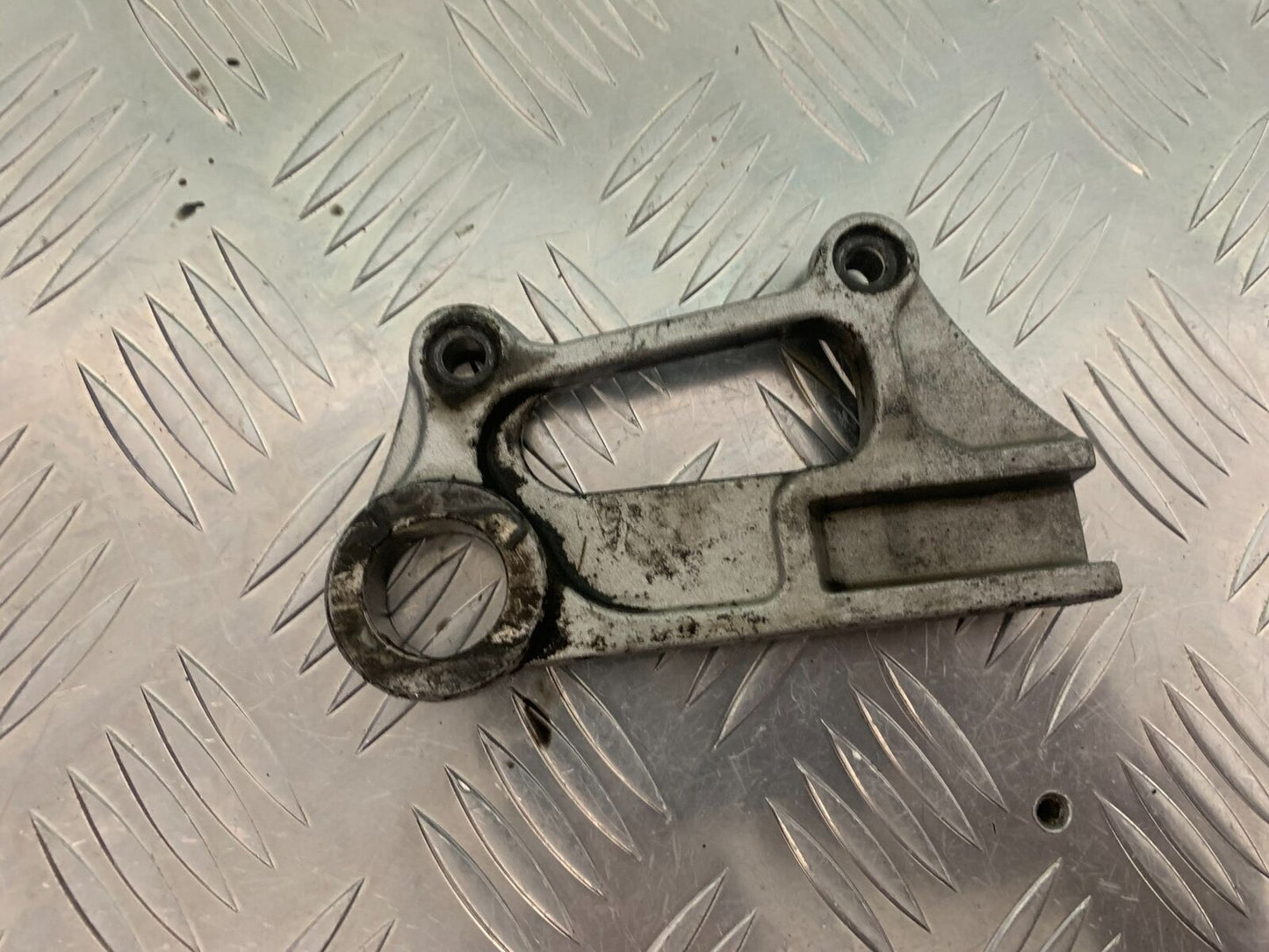 KAWASAKI ZX6R ZX6 J REAR CALIPER BRACKET YEAR 2000 (STOCK 947)