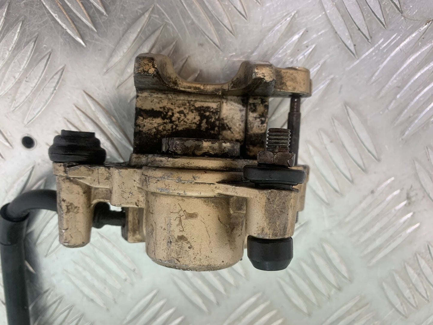 HONDA CBR125 CBR 125 REAR CALIPER (SOLD AS PARTS ) YEAR 2004-06 (CMB1040)