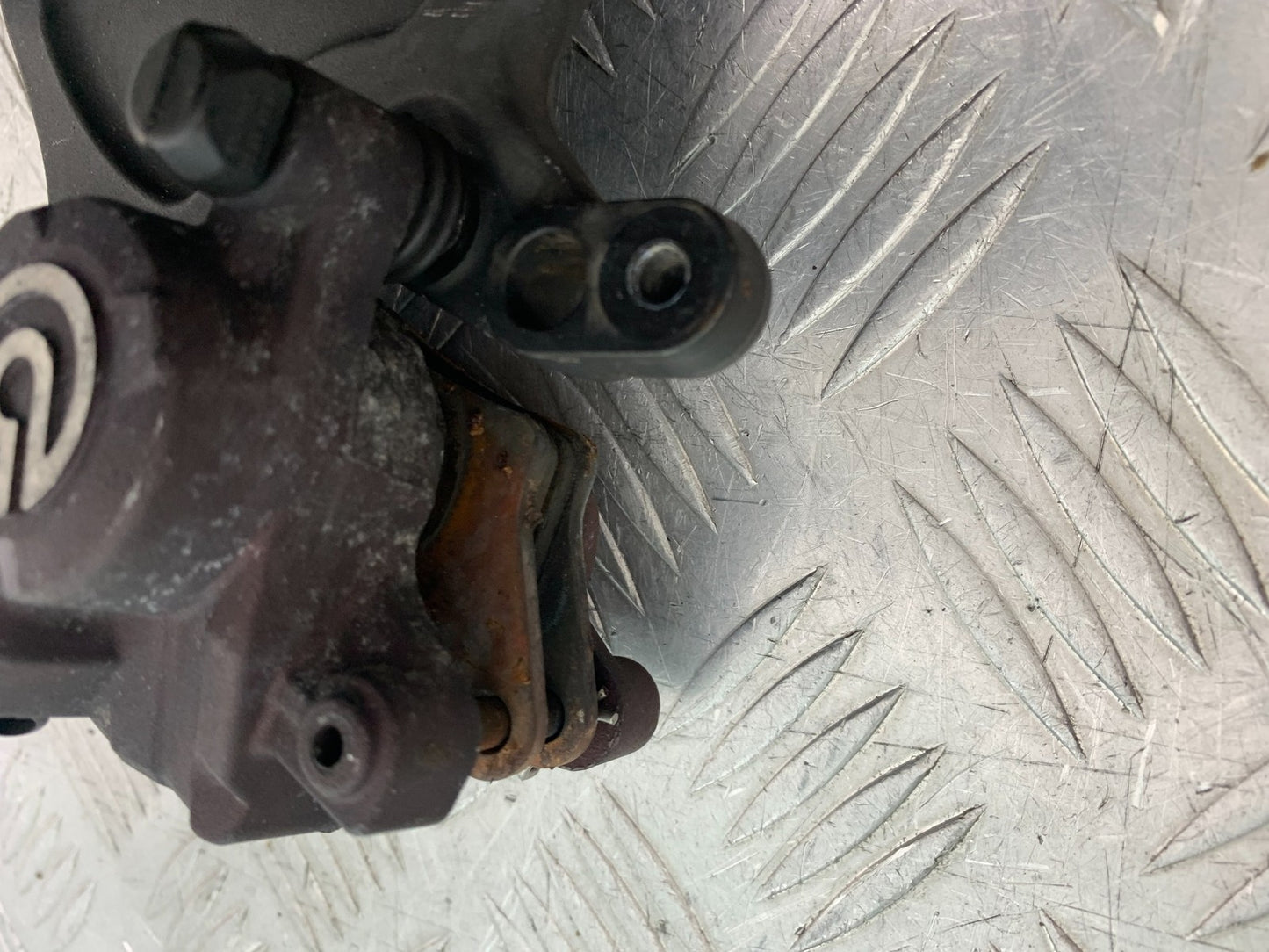 TRIUMPH 675 STREET TRIPLE RX REAR BRAKE CALIPER   2015- 2017 (CMB1299)
