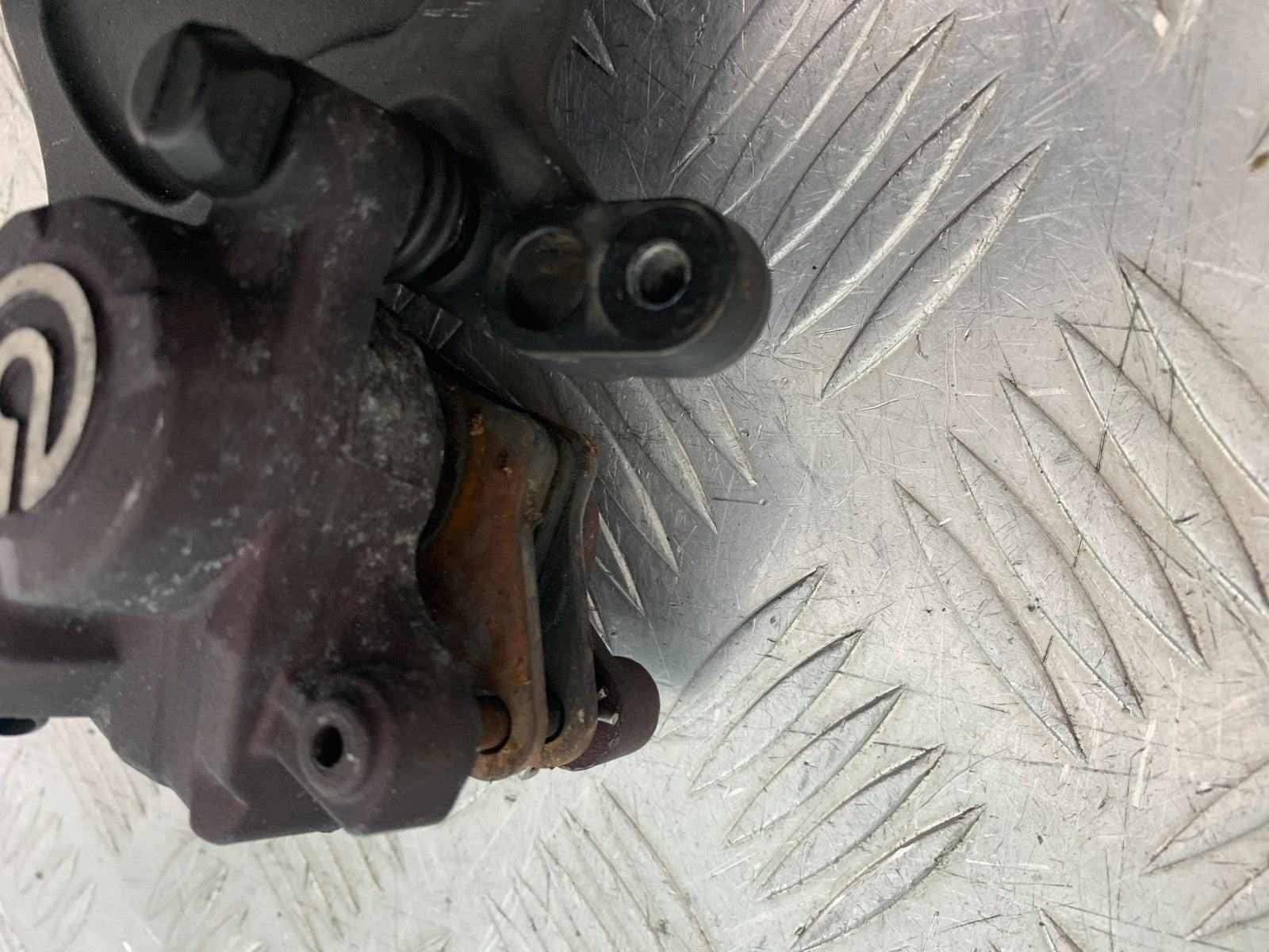 TRIUMPH 675 STREET TRIPLE RX REAR BRAKE CALIPER   2015- 2017 (CMB1299)
