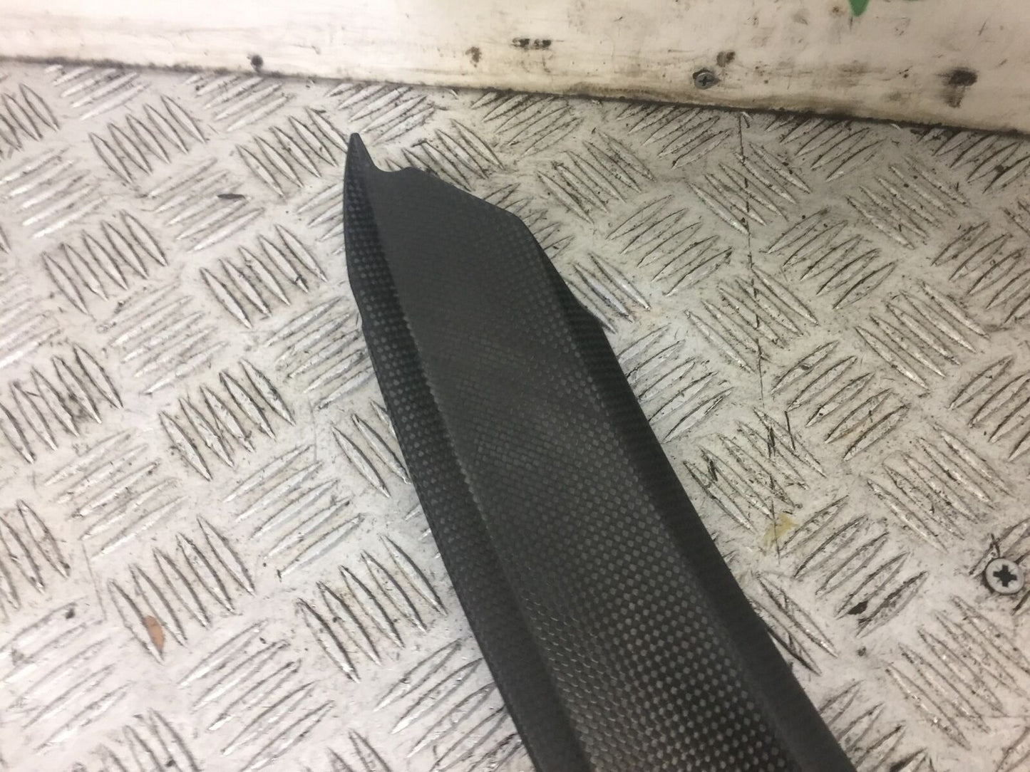 TRIUMPH 675 DAYTONA CARBON LEFT TOP INFILL  YEAR 2008-2011 (STOCK 640)