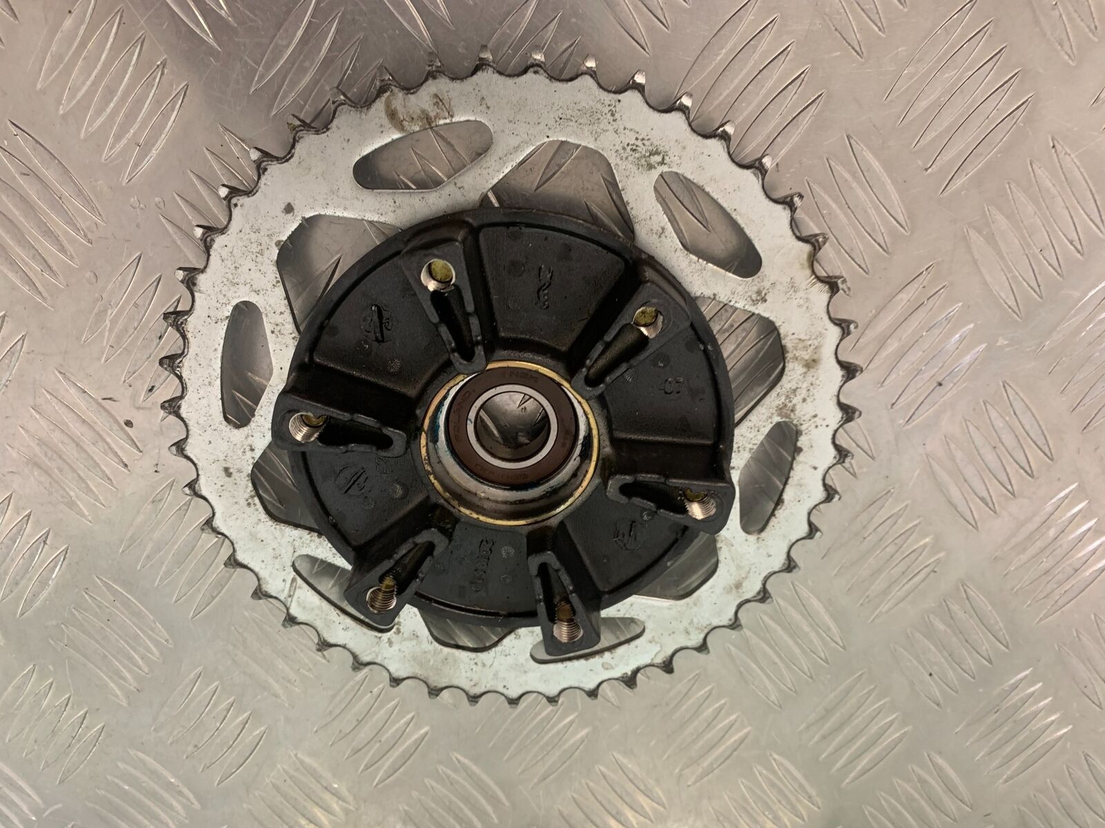 TRIUMPH 675 STREET TRIPLE SPROCKET CARRIER   YEAR 2008 (STOCK 984)