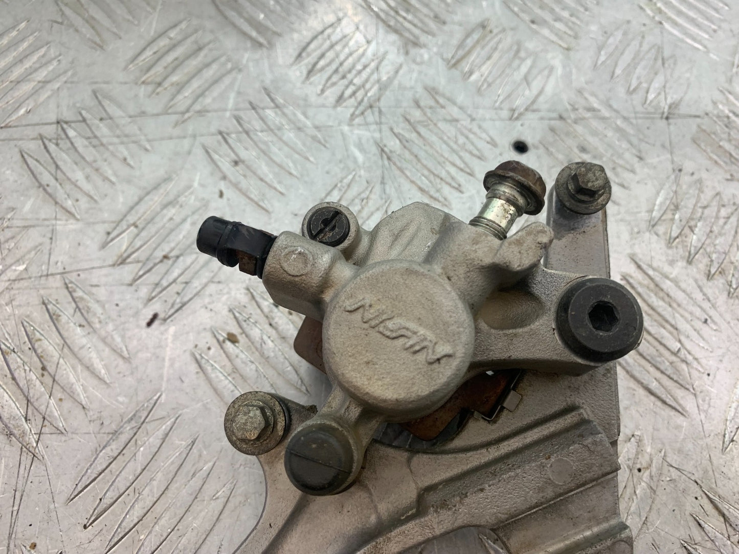 KAWASAKI KXF450 KXF 450 REAR BRAKE CALIPER AND BRACKET  YEAR 2013 CMB1217)