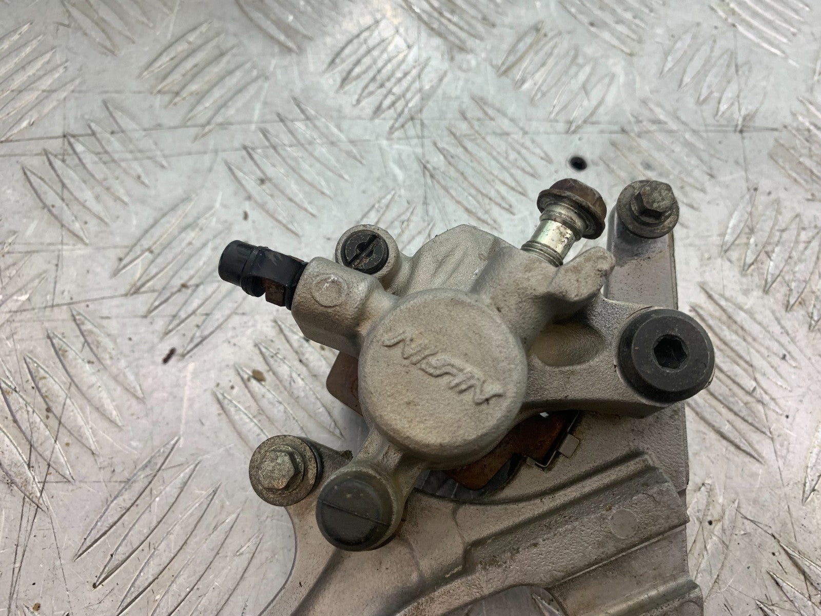 KAWASAKI KXF450 KXF 450 REAR BRAKE CALIPER AND BRACKET  YEAR 2013 CMB1217)