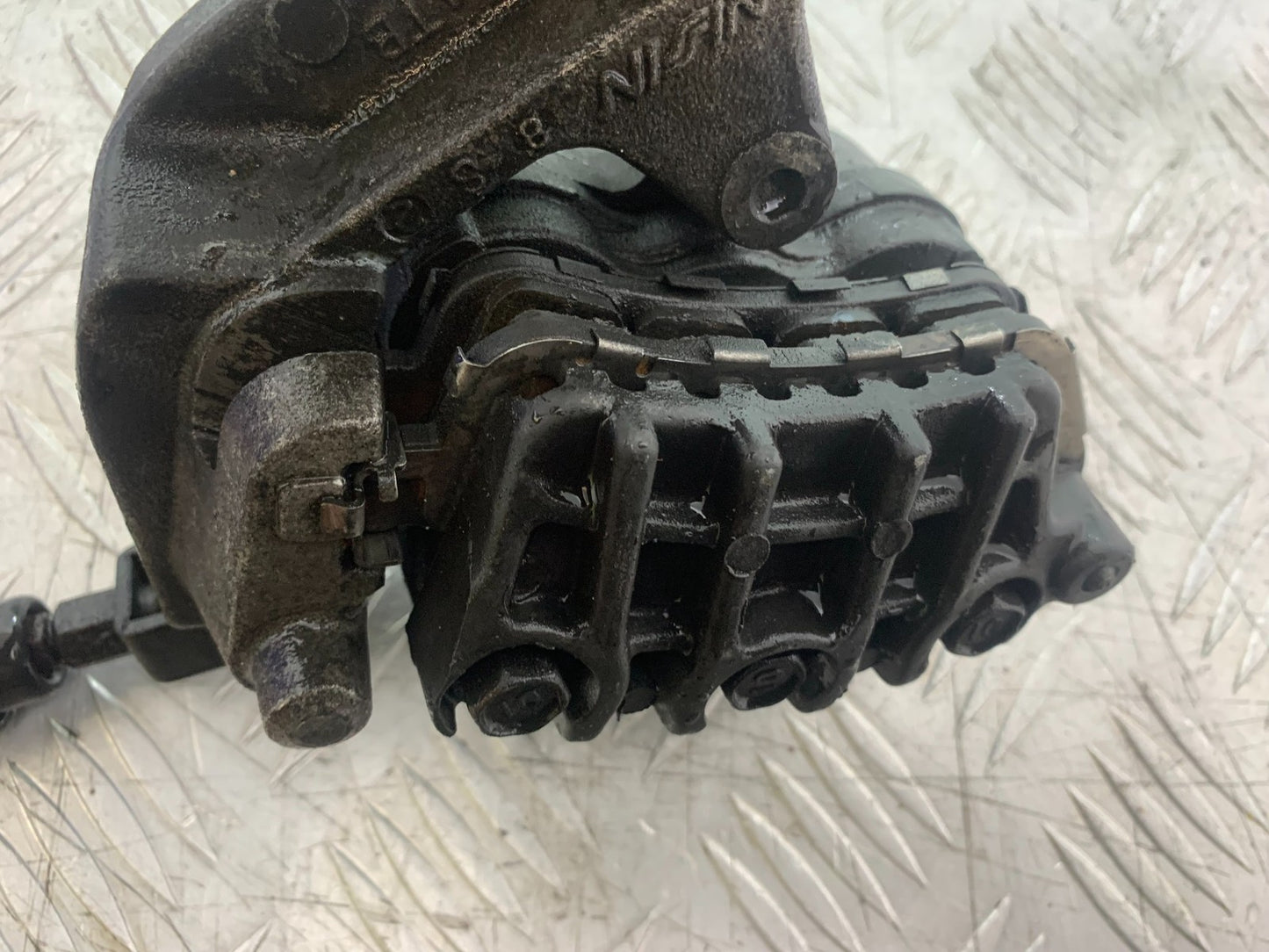 HONDA CBR1100 BLACKBIRD FRONT LEFT CALIPER AND BRACKET  YEAR 1999-2005 (CMB1232)