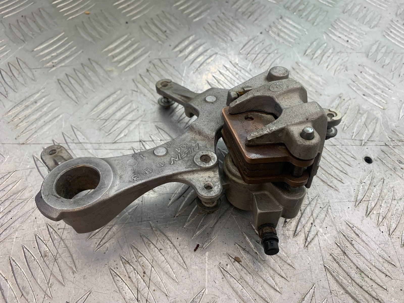 KAWASAKI KXF450 KXF 450 REAR BRAKE CALIPER AND BRACKET  YEAR 2013 CMB1217)