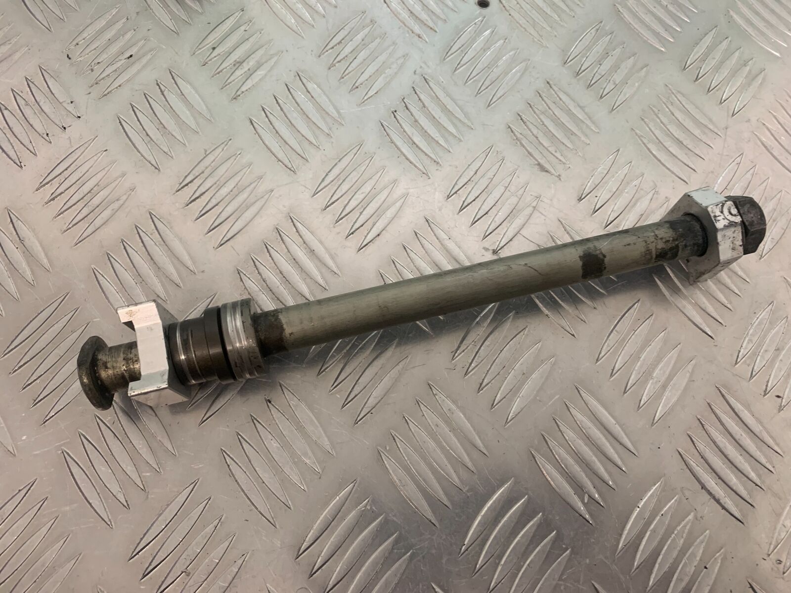 TRIUMPH 675 STREET TRIPLE RX REAR WHEEL  SPINDLE YEAR  2015-17 (STOCK 971)