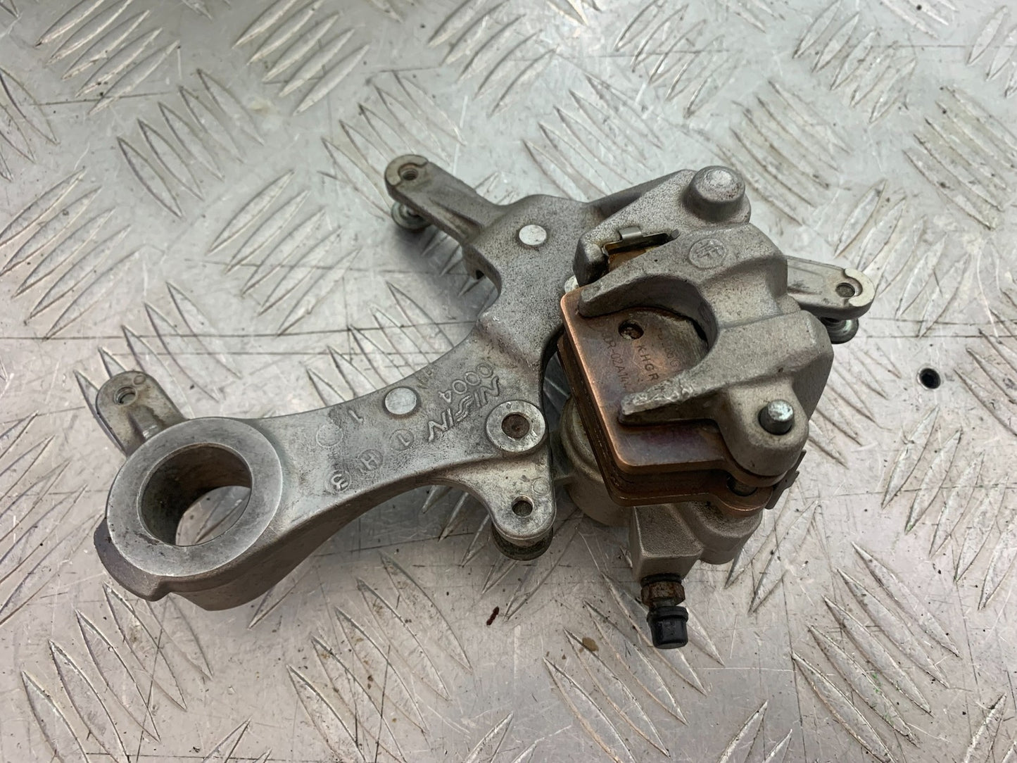 KAWASAKI KXF450 KXF 450 REAR BRAKE CALIPER AND BRACKET  YEAR 2013 CMB1217)
