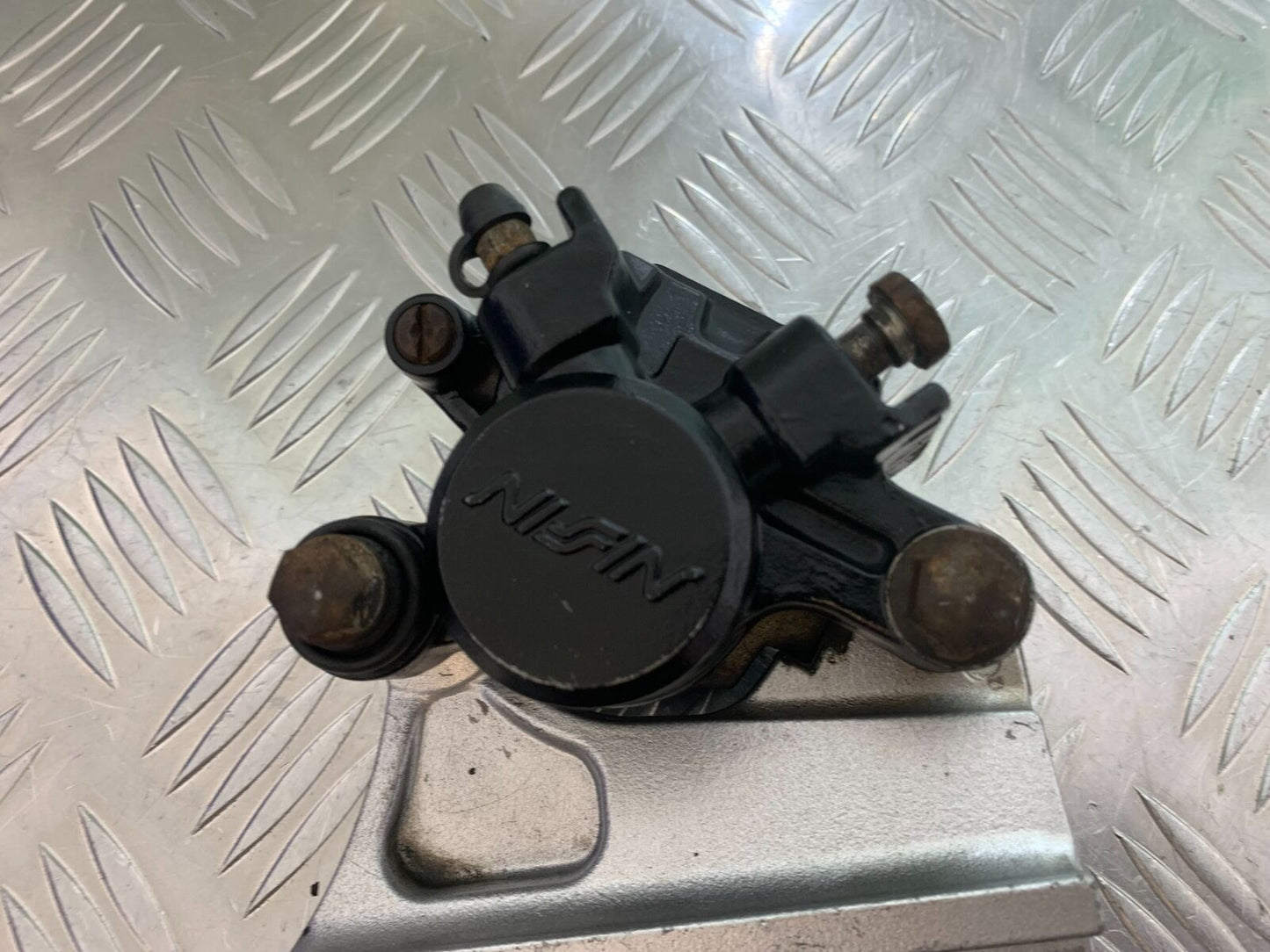 TRIUMPH 600 DAYTONA REAR CALIPER  YEAR 2003-2006 (STOCK 999)