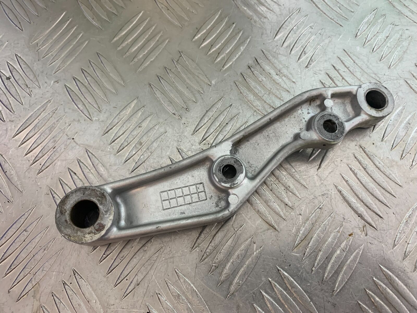 SUZUKI VS1400 VS 1400 INTRUDER  REAR CALIPER BRACKET   YEAR 1988 (CMB1077)