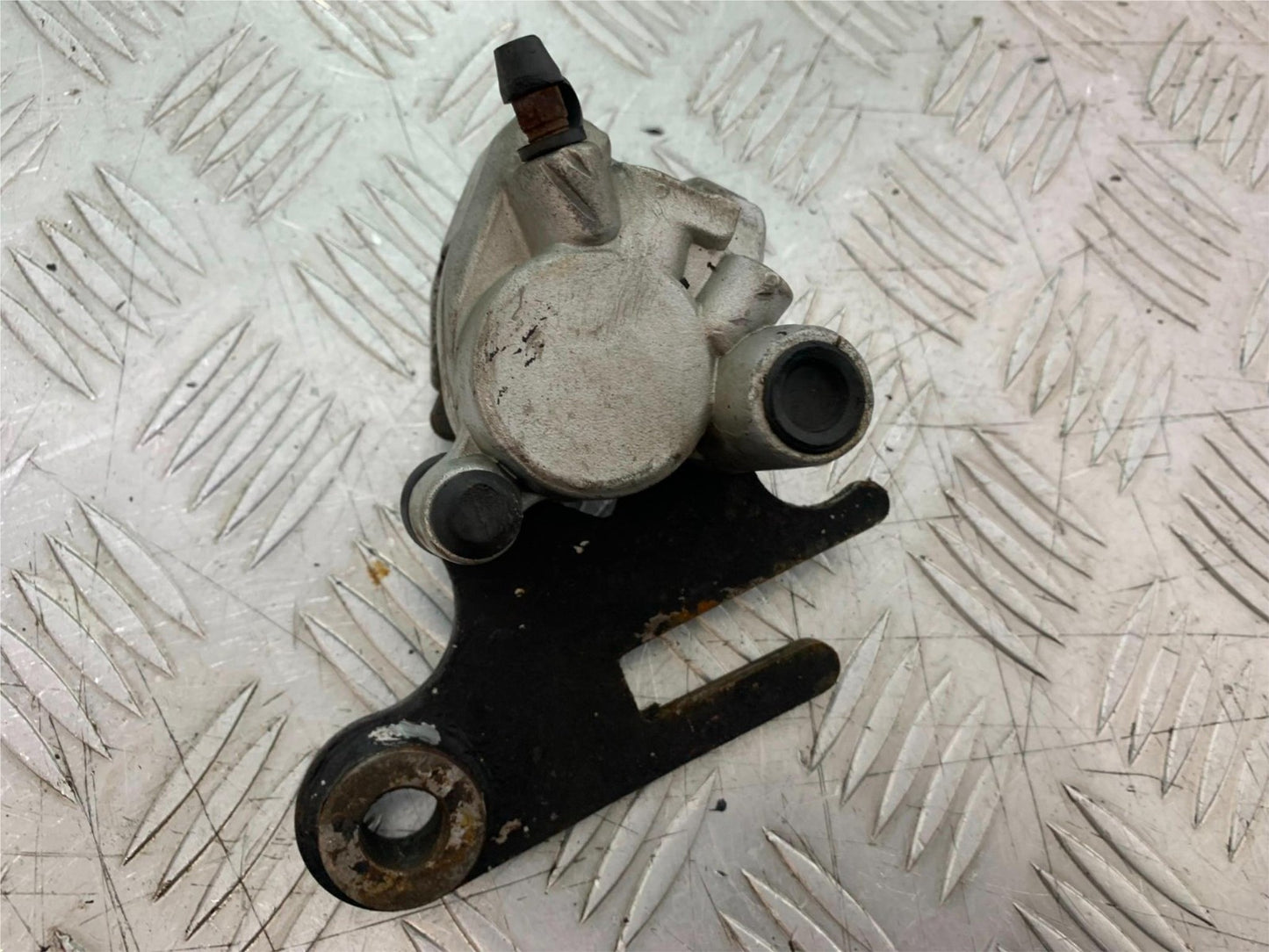QINGQI QM125 GY-2B REAR BRAKE CALIPER YEAR 2016 (CMB1228)