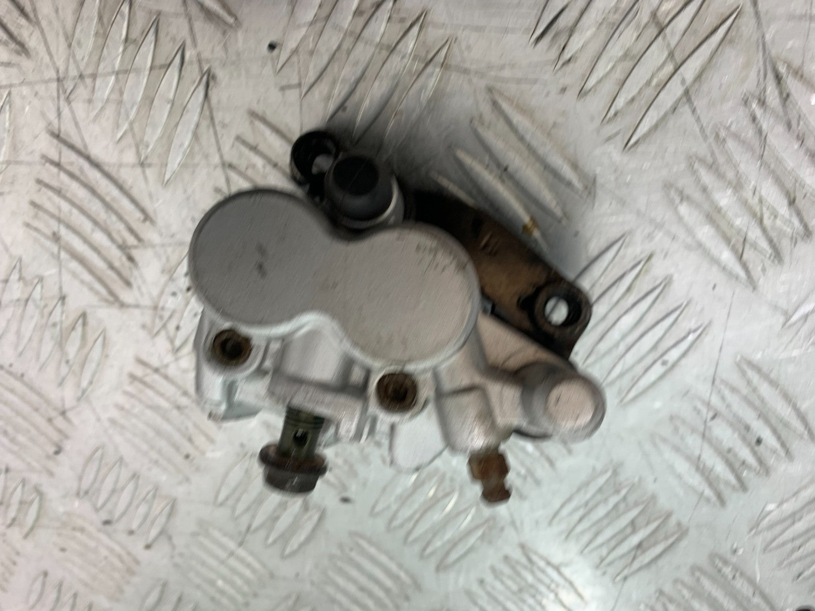 QINGQI QM125 GY-2B FRONT BRAKE CALIPER YEAR 2016 (CMB1228)