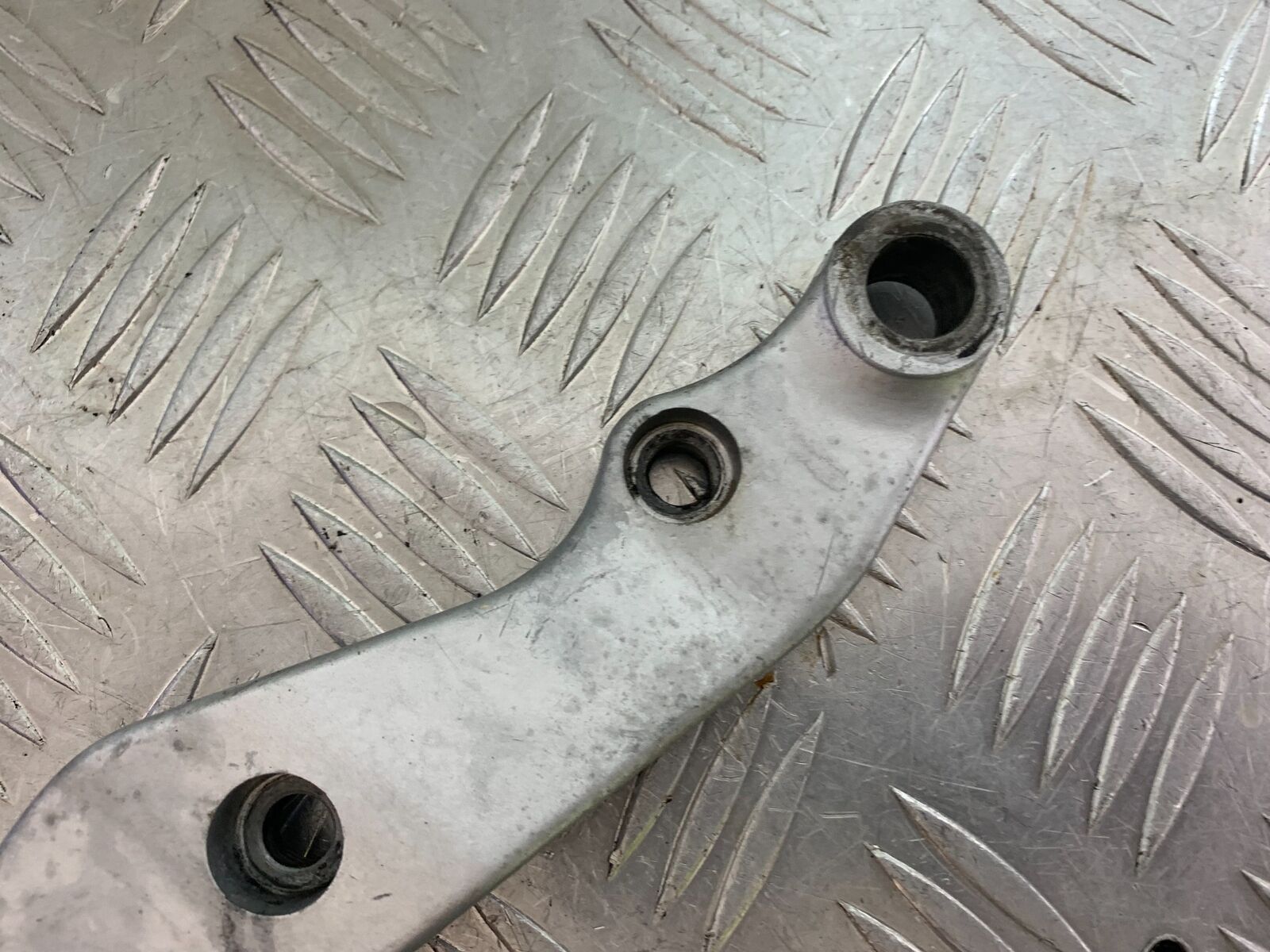 SUZUKI VS1400 VS 1400 INTRUDER  REAR CALIPER BRACKET   YEAR 1988 (CMB1077)