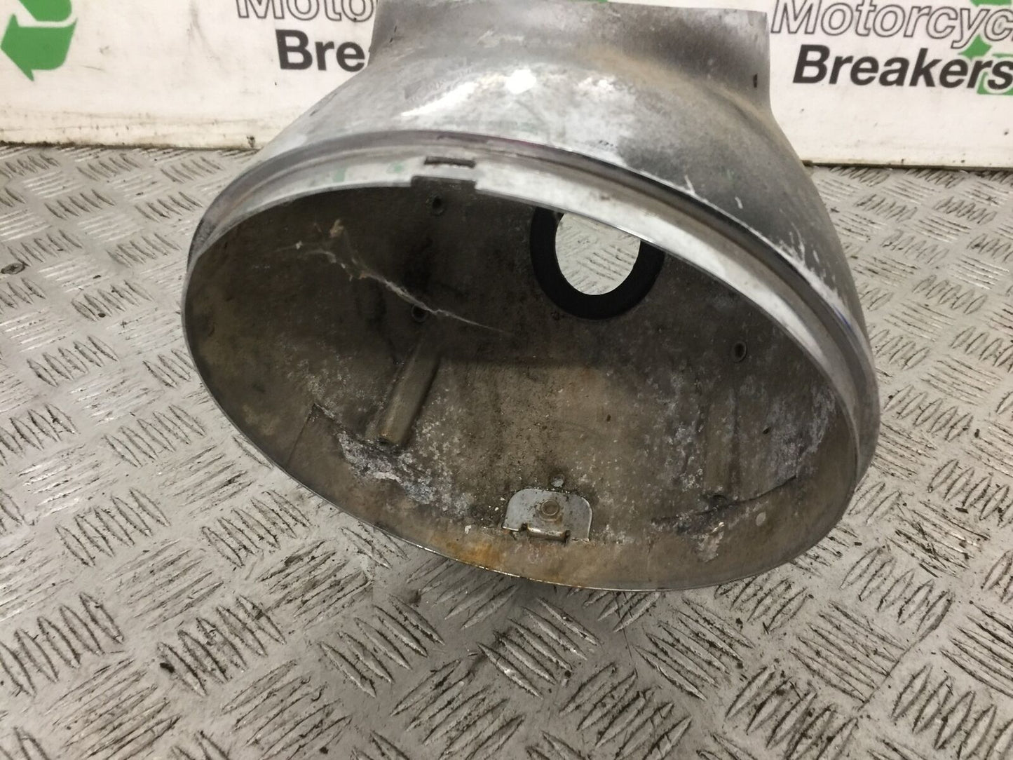 VICTORY V92 C HEADLIGHT BACKING  YEAR 2004 (STOCK 765)