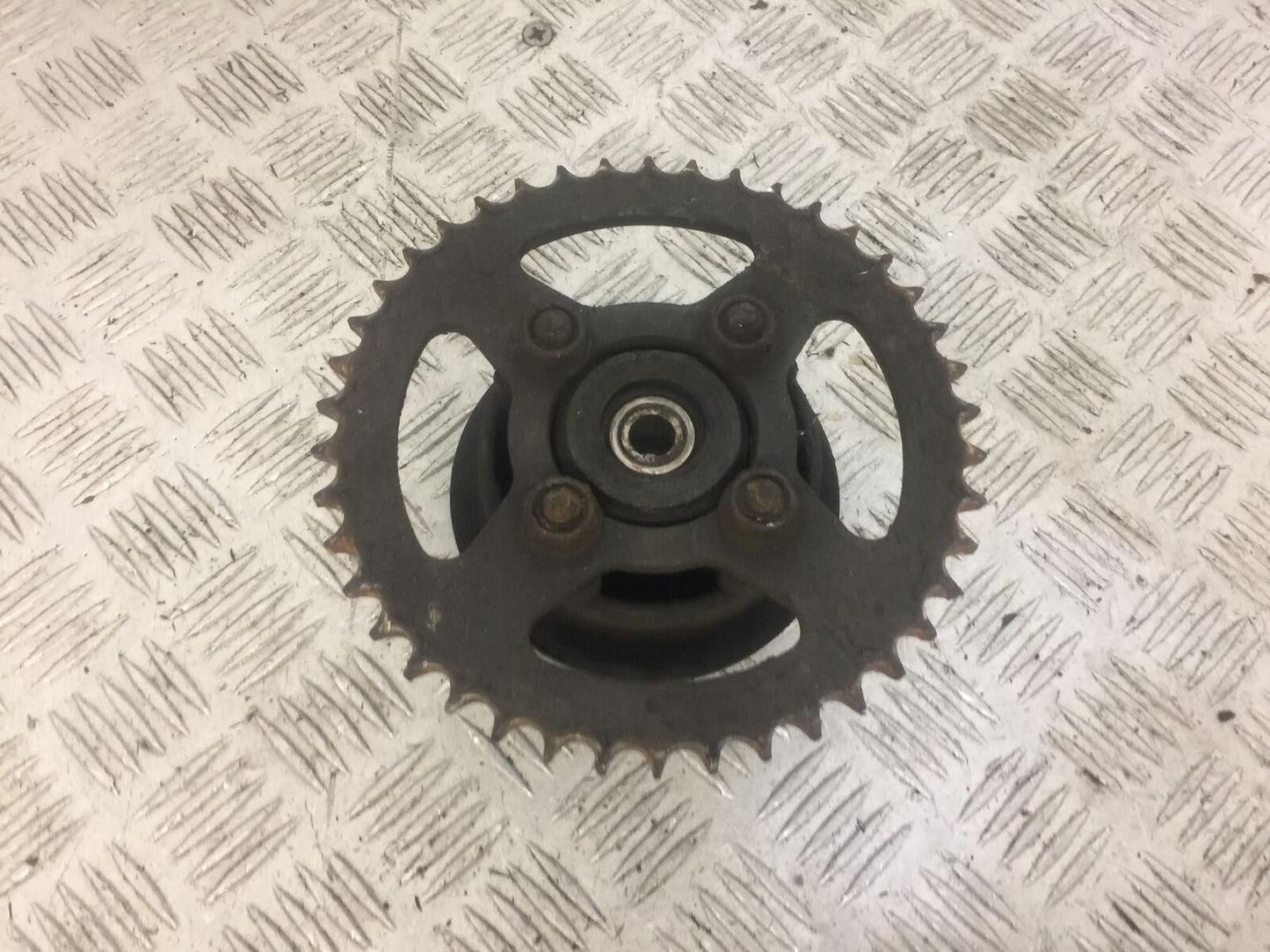 HONDA CBR125 CBR 125 REAR SPROCKET CARRIER  YEAR 2008 (STOCK 627)