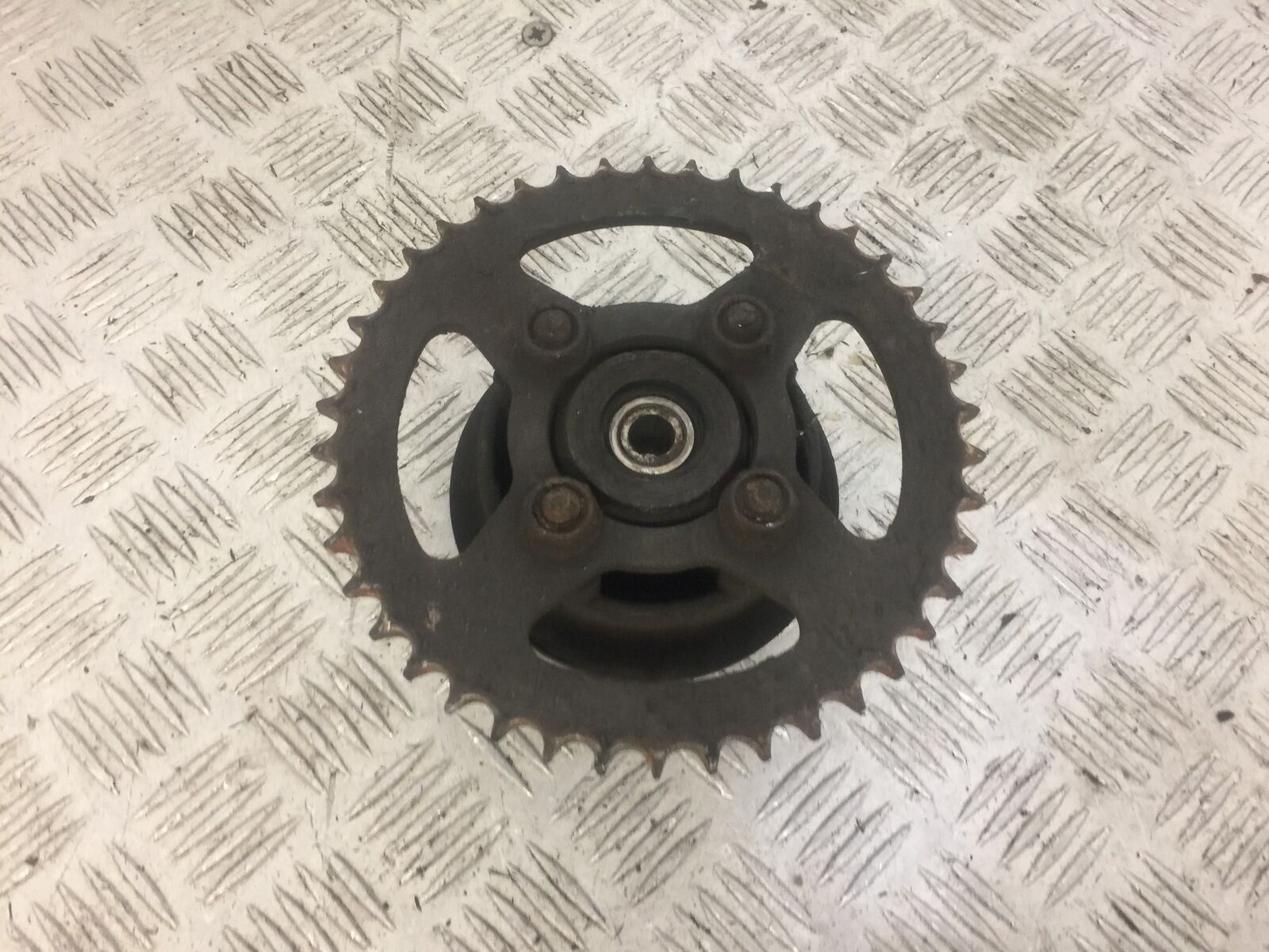 HONDA CBR125 CBR 125 REAR SPROCKET CARRIER  YEAR 2008 (STOCK 627)