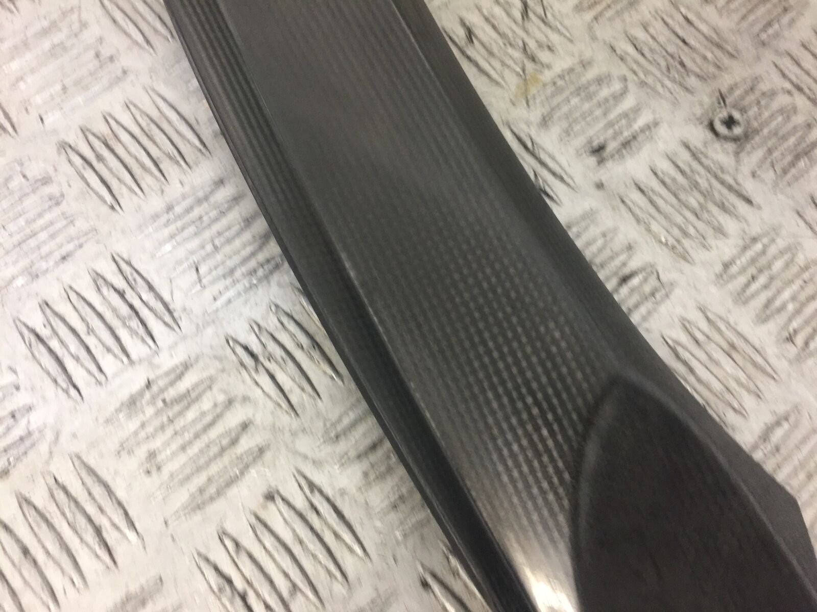 TRIUMPH 675 DAYTONA CARBON LEFT TOP INFILL  YEAR 2008-2011 (STOCK 640)