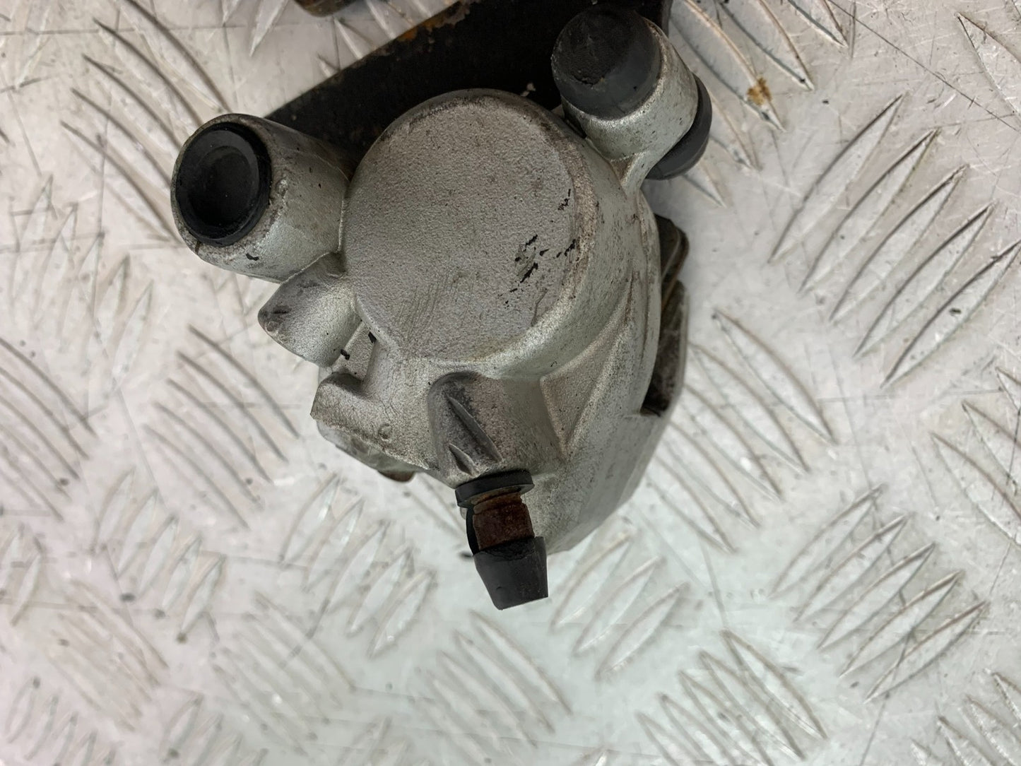 QINGQI QM125 GY-2B REAR BRAKE CALIPER YEAR 2016 (CMB1228)