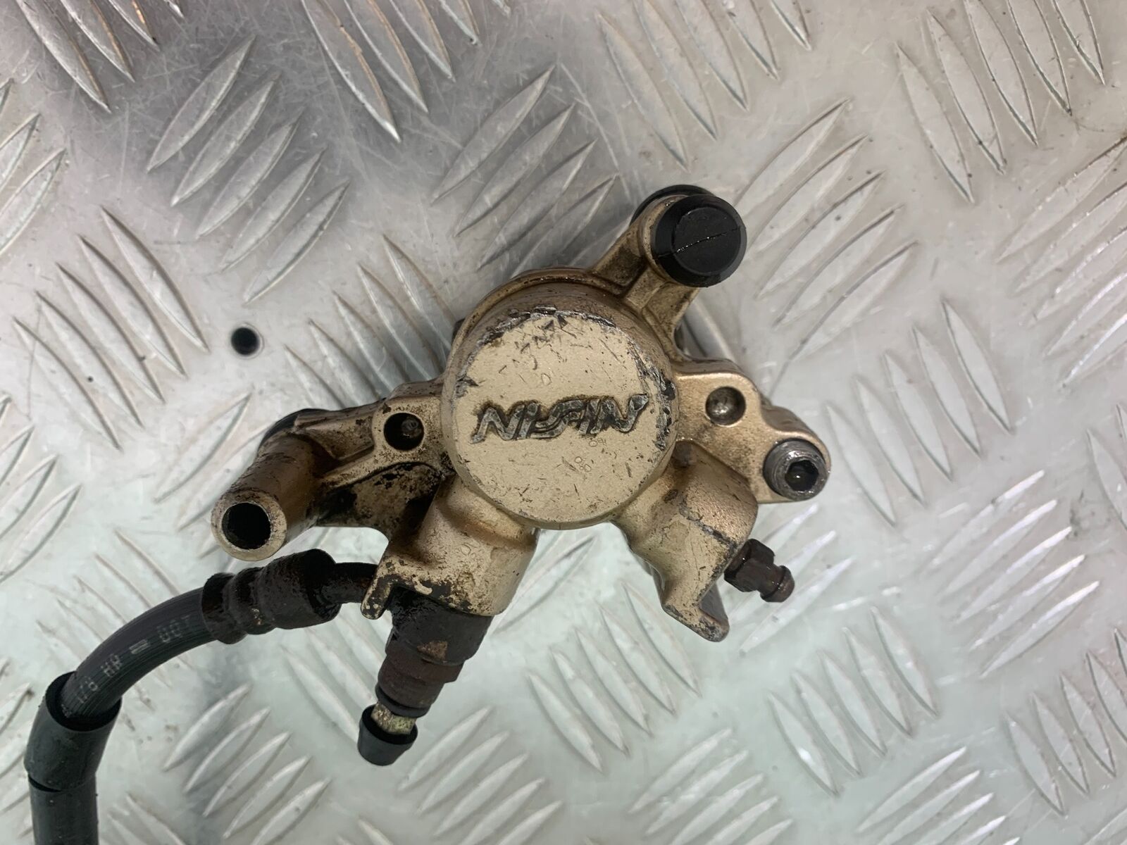 HONDA CBR125 CBR 125 REAR CALIPER  (SOLD AS PARTS ) YEAR 2004-06  (CMB1040)