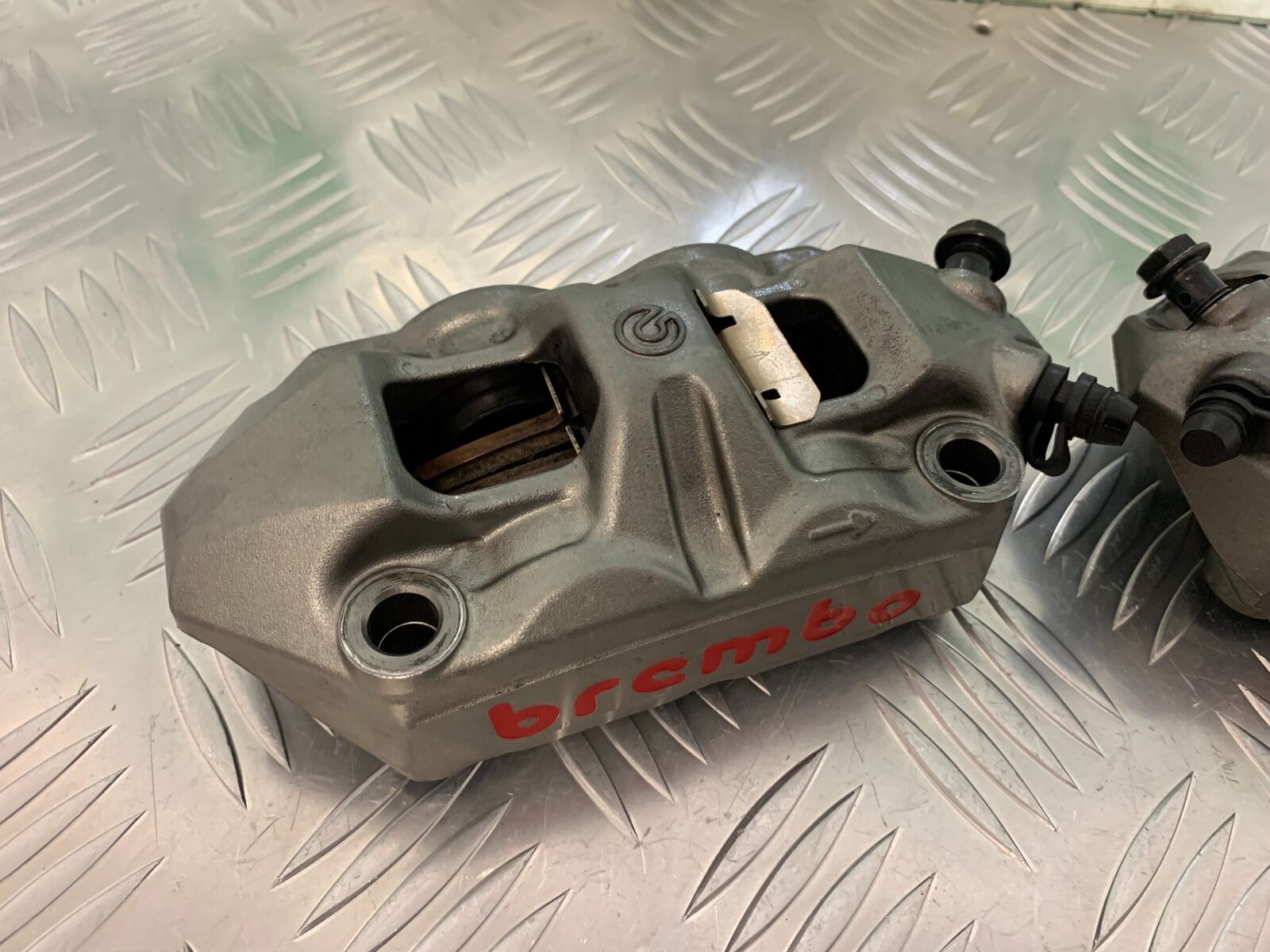 TRIUMPH SPEED TRIPLE R 1050 BREMBO FRONT CALIPERS  YEAR 2014 (STOCK 934)