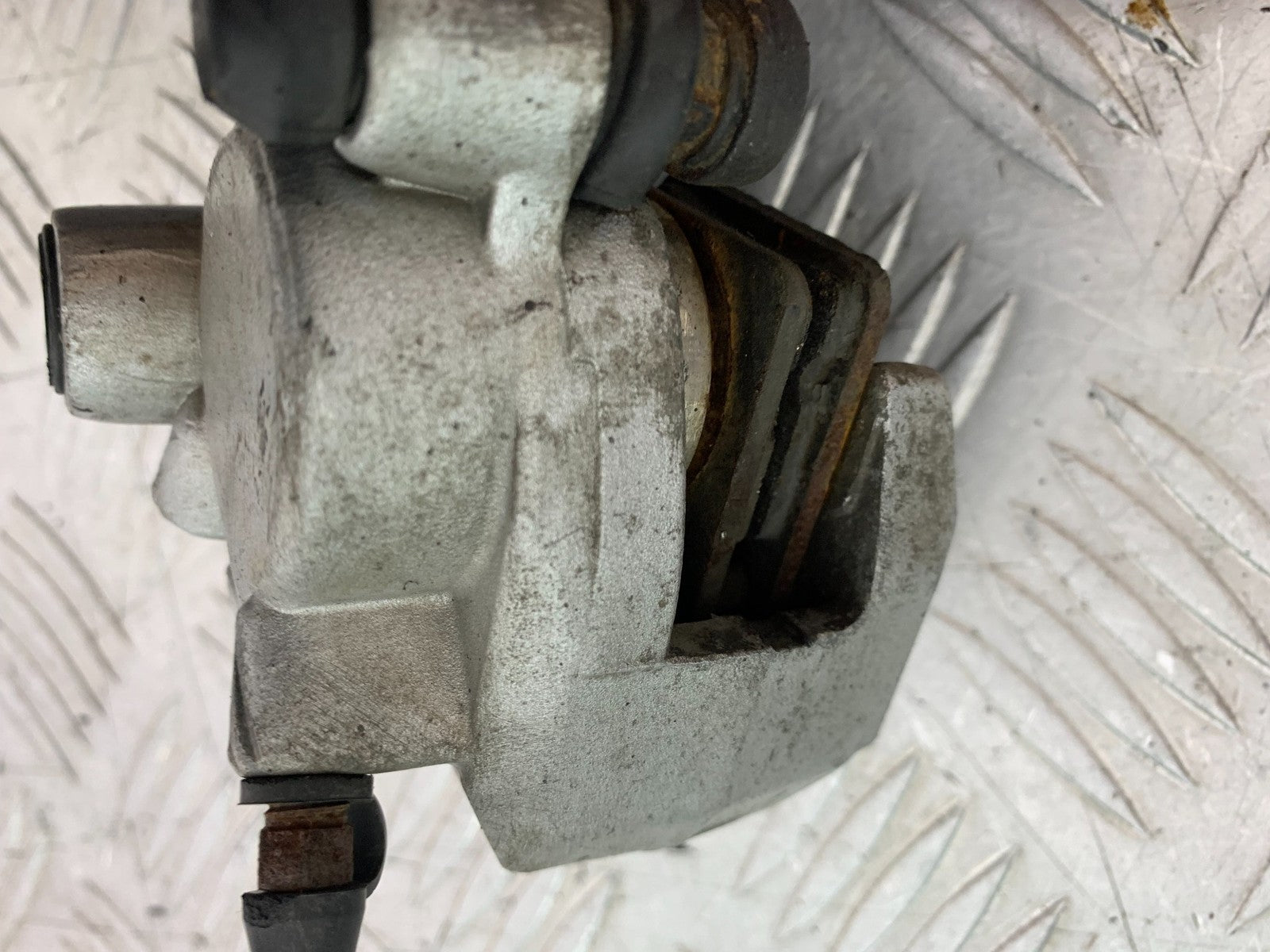 QINGQI QM125 GY-2B REAR BRAKE CALIPER YEAR 2016 (CMB1228)
