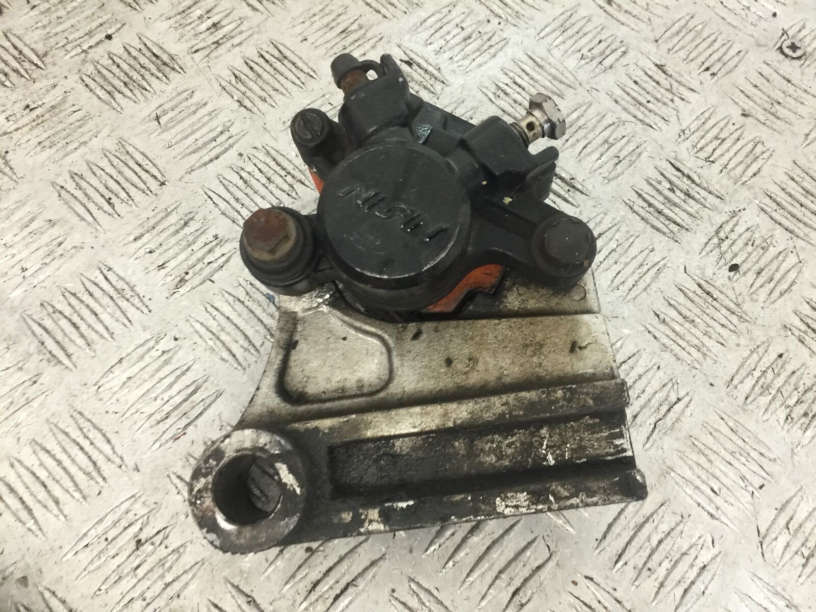 TRIUMPH 600 SPEED FOUR REAR BRAKE CALIPER   YEAR 2002  (STOCK 756)