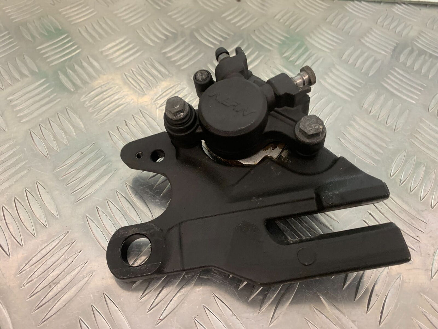 TRIUMPH TIGER 800 XCX REAR BRAKE CALIPER YEAR 2015-2017  (STOCK 966)