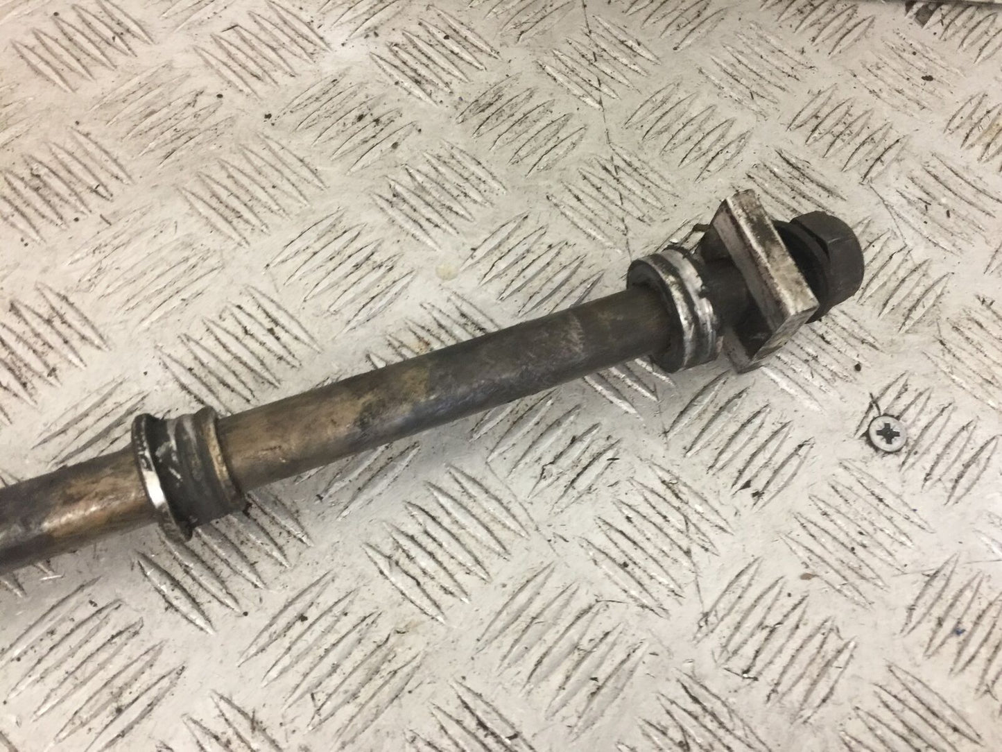 TRIUMPH 600 SPEED FOUR REAR WHEEL SPINDLE  YEAR 2002  (STOCK 756)