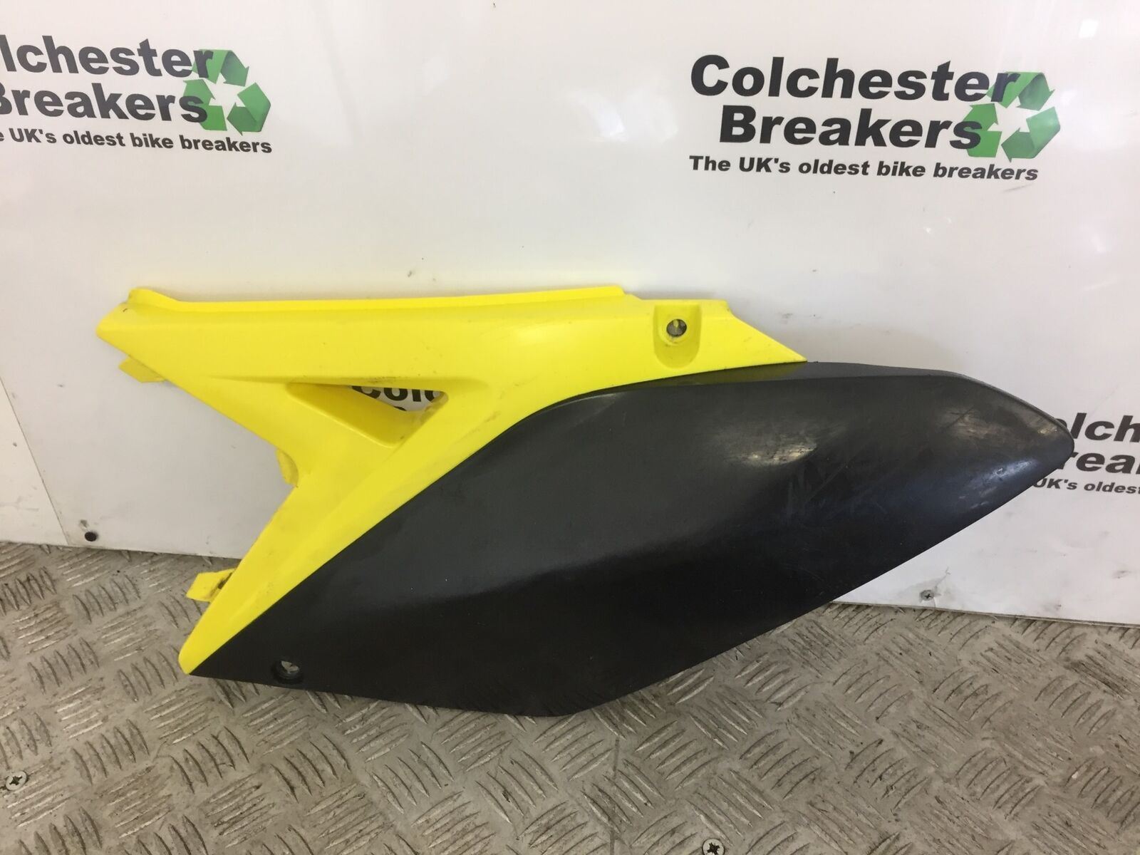 SUZUKI RMZ250 RMZ 250 LEFT SEAT SIDE PANEL   YEAR 2010
