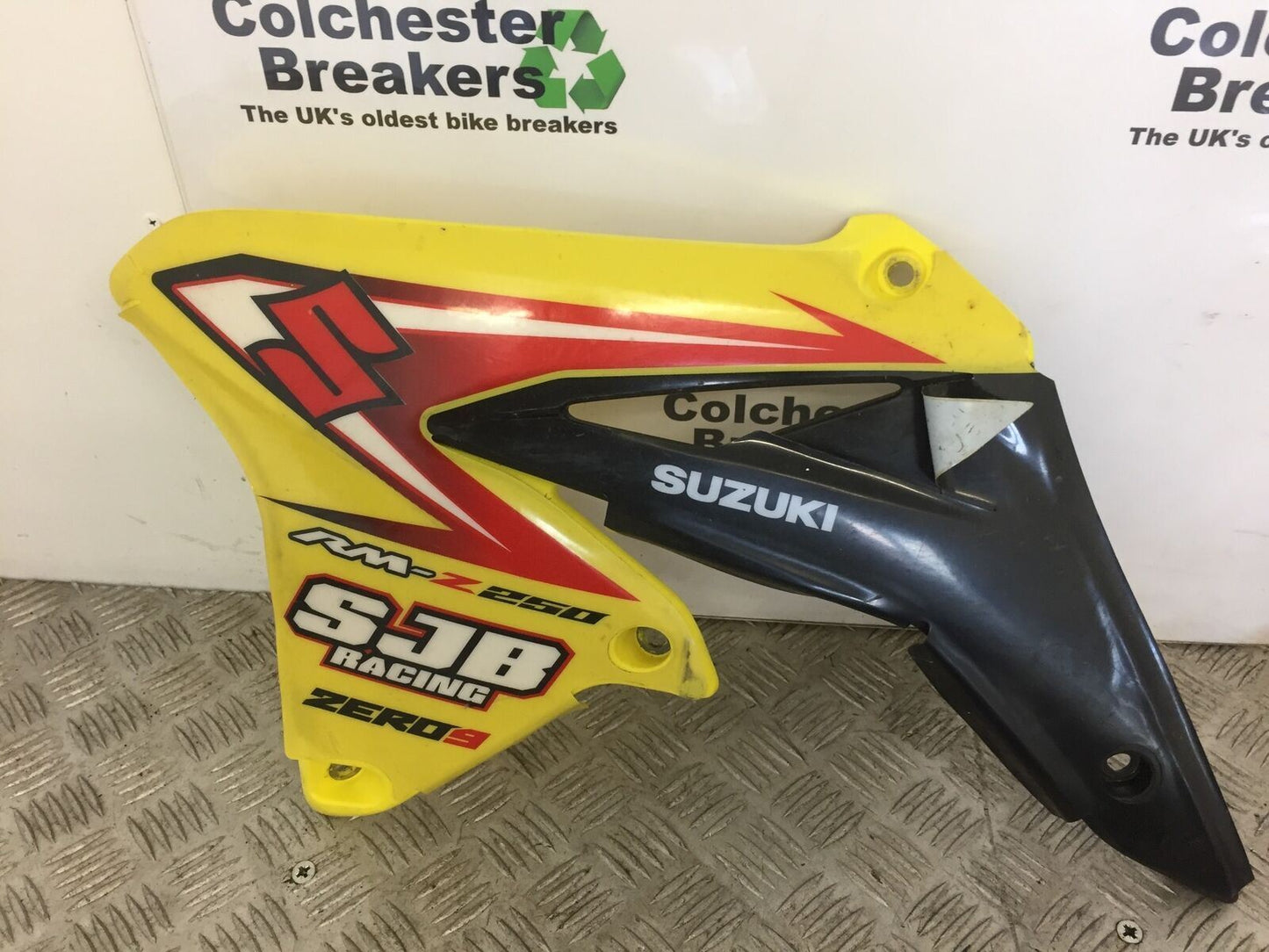 SUZUKI RMZ250 RMZ 250 LEFT RADIATOR COWL    YEAR 2010