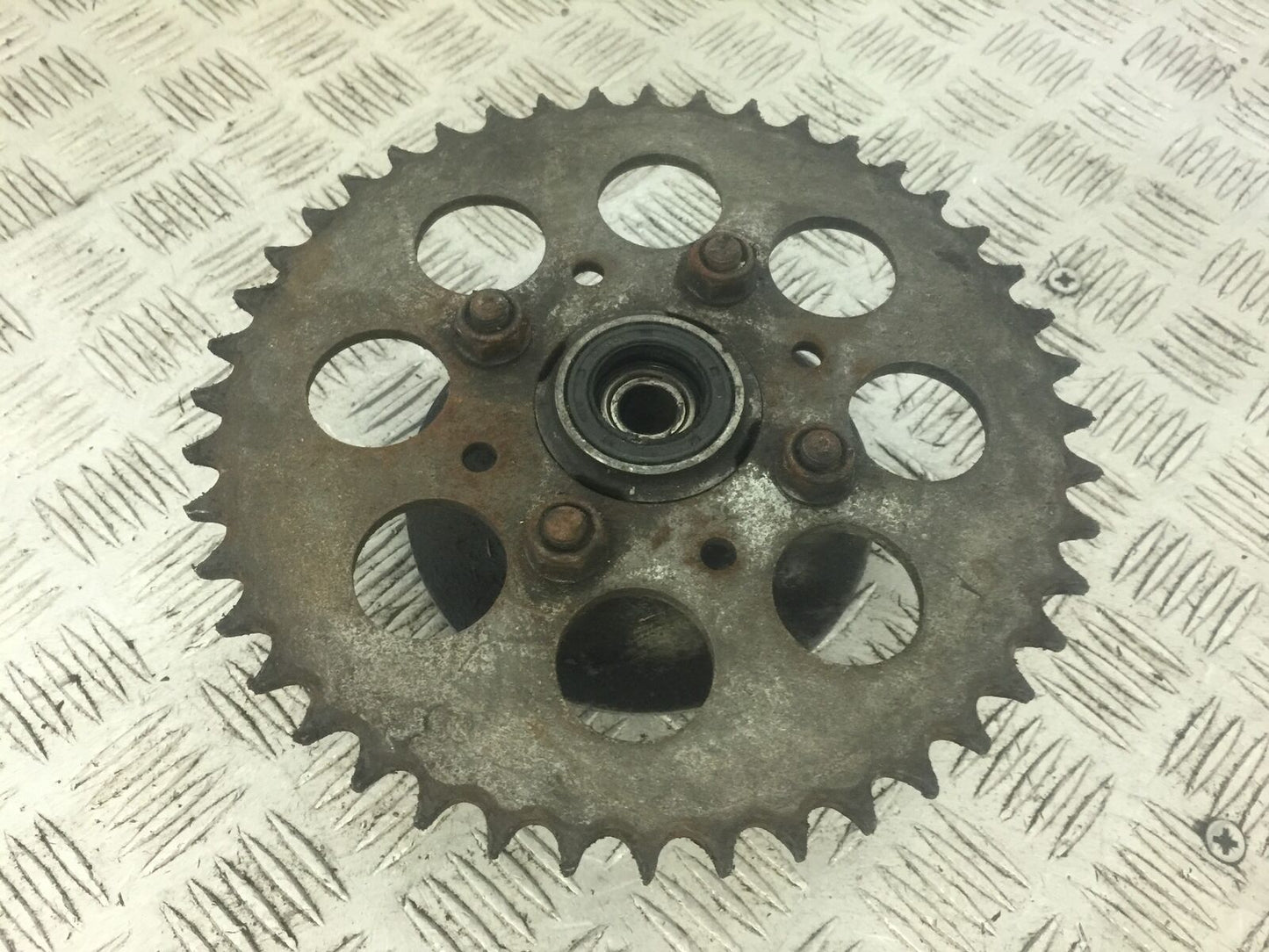 HONDA XL125 VARADERO SPROCKET CARRIER  2004 (STOCK 697)