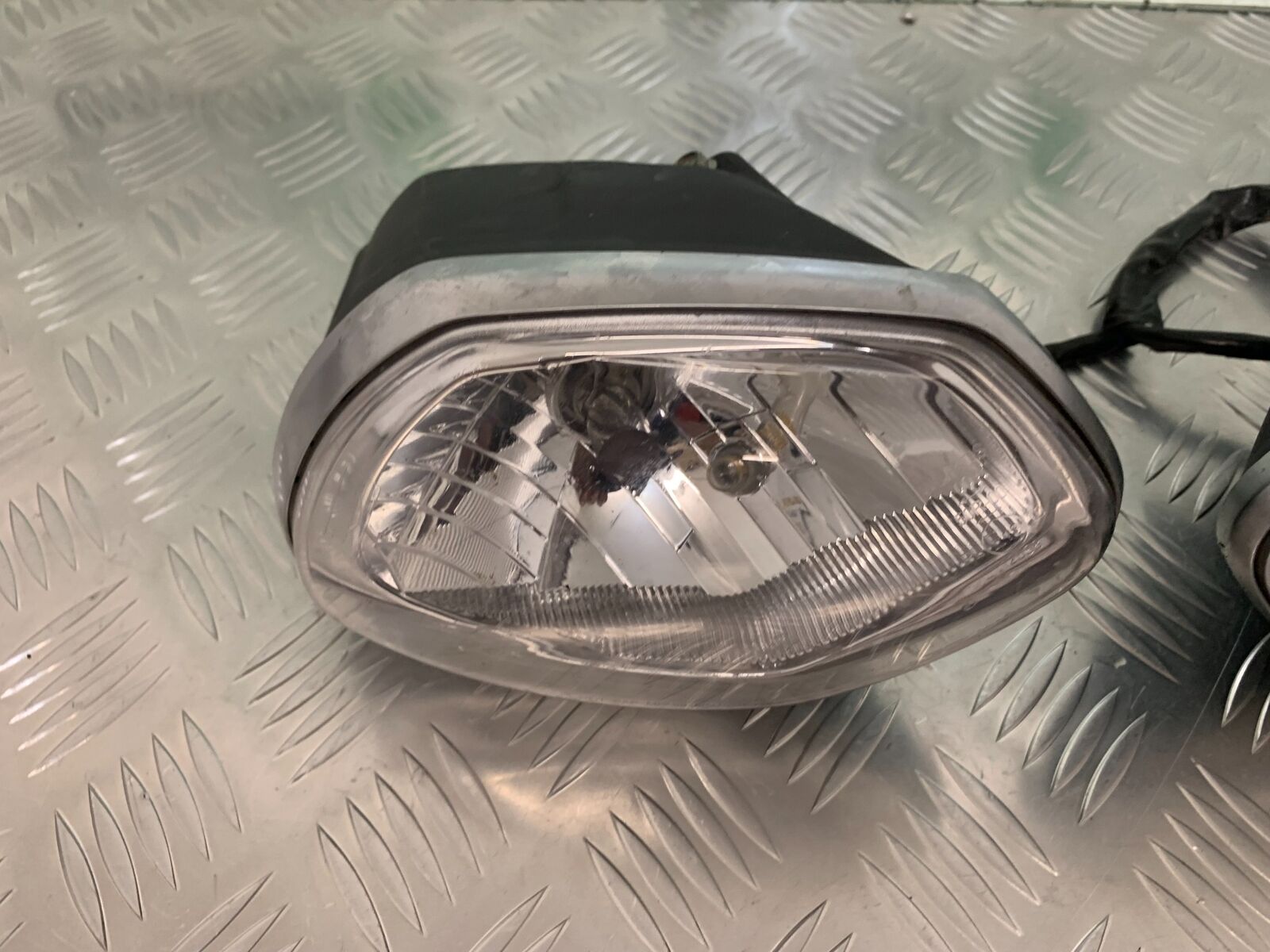 TRIUMPH SPEED TRIPLE R 1050 HEADLIGHTS   YEAR 2014 (STOCK 934)