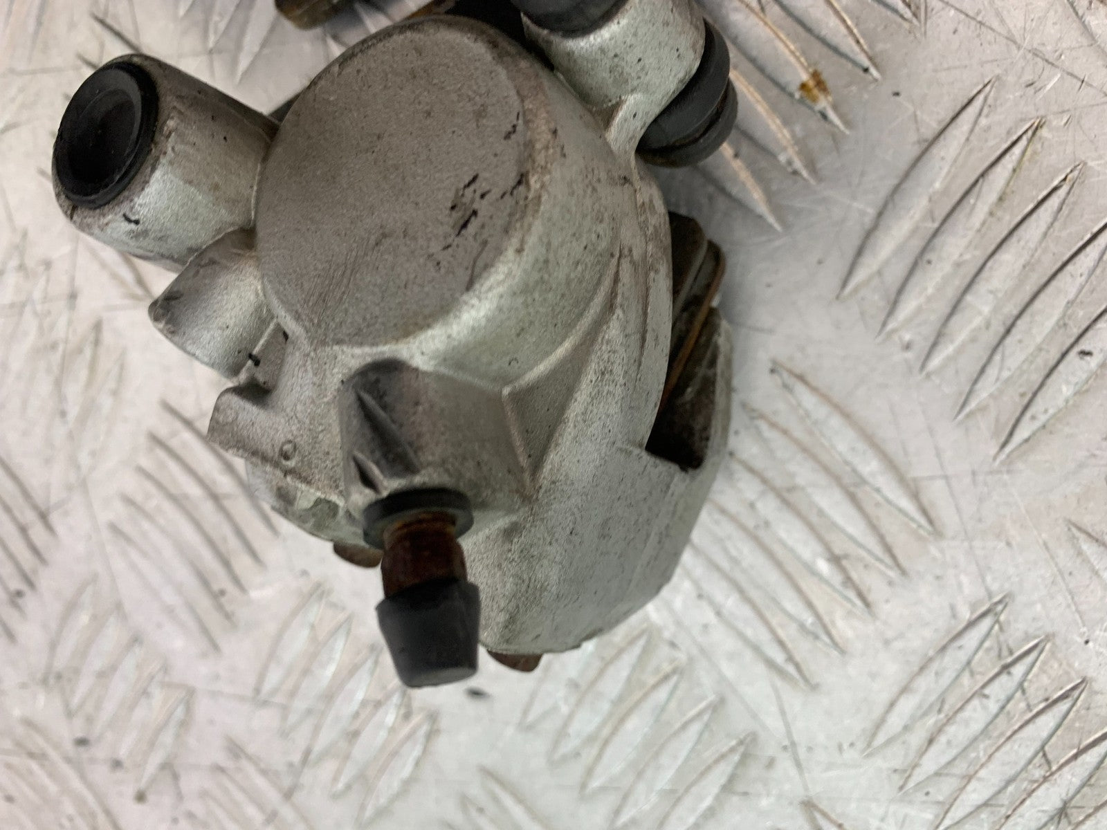 QINGQI QM125 GY-2B REAR BRAKE CALIPER YEAR 2016 (CMB1228)