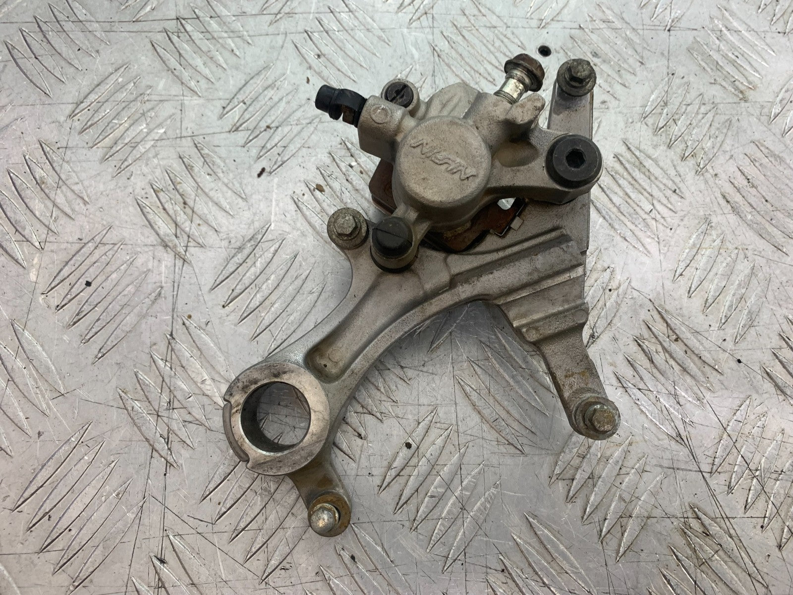KAWASAKI KXF450 KXF 450 REAR BRAKE CALIPER AND BRACKET  YEAR 2013 CMB1217)