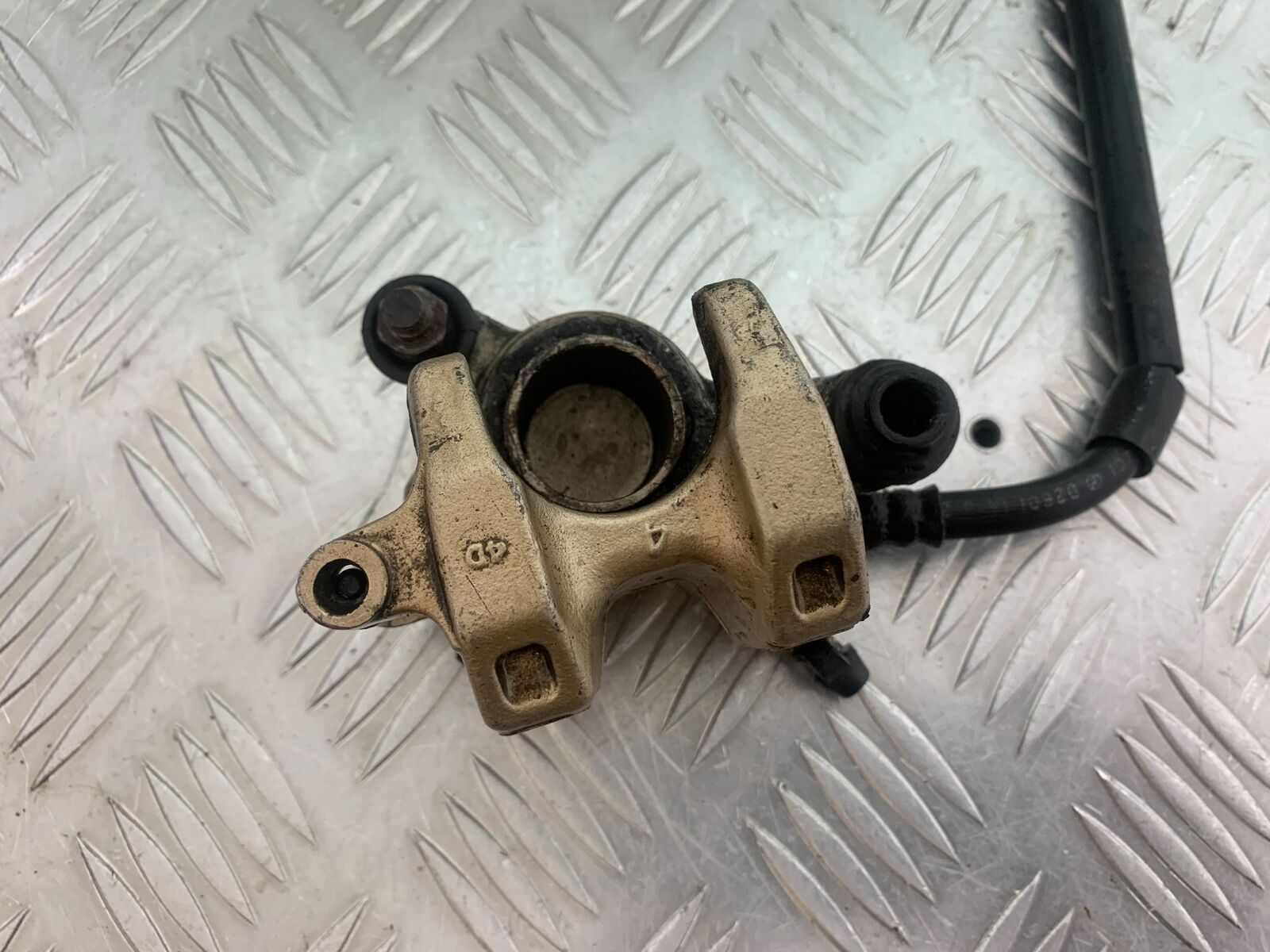 HONDA CBR125 CBR 125 REAR CALIPER  (SOLD AS PARTS ) YEAR 2004-06  (CMB1040)