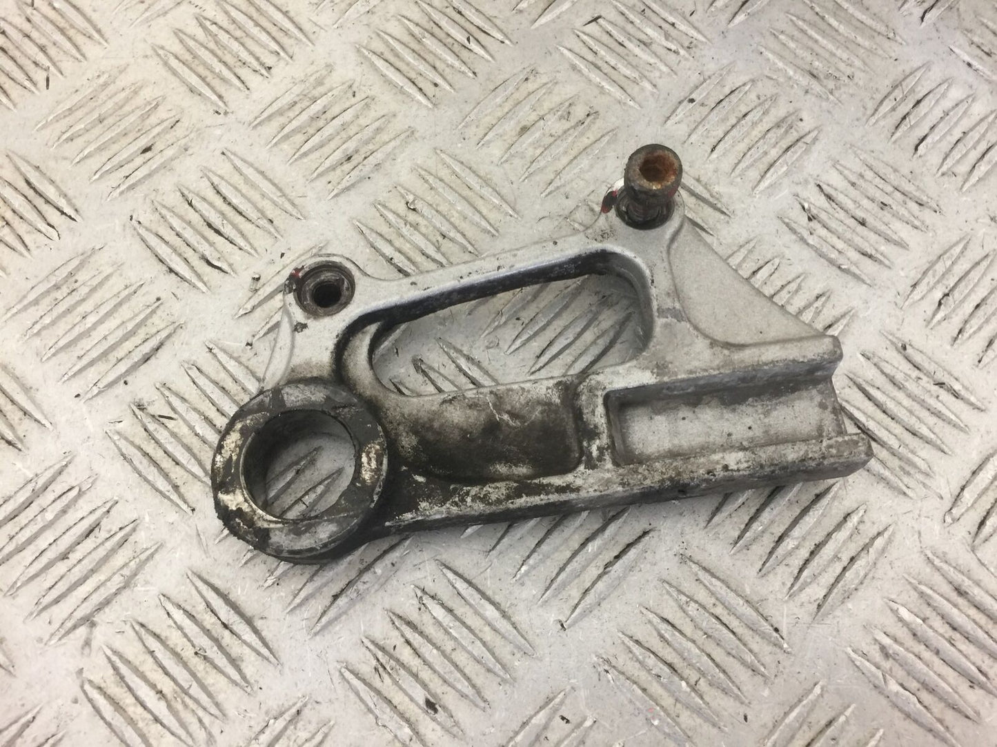 KAWASAKI ZX6R ZX6 J REAR CALIPER BRACKET  YEAR 2000  (STOCK 456)