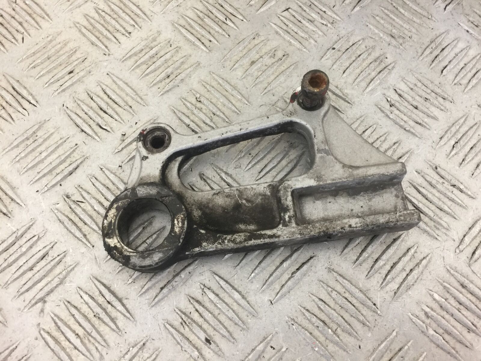 KAWASAKI ZX6R ZX6 J REAR CALIPER BRACKET  YEAR 2000  (STOCK 456)