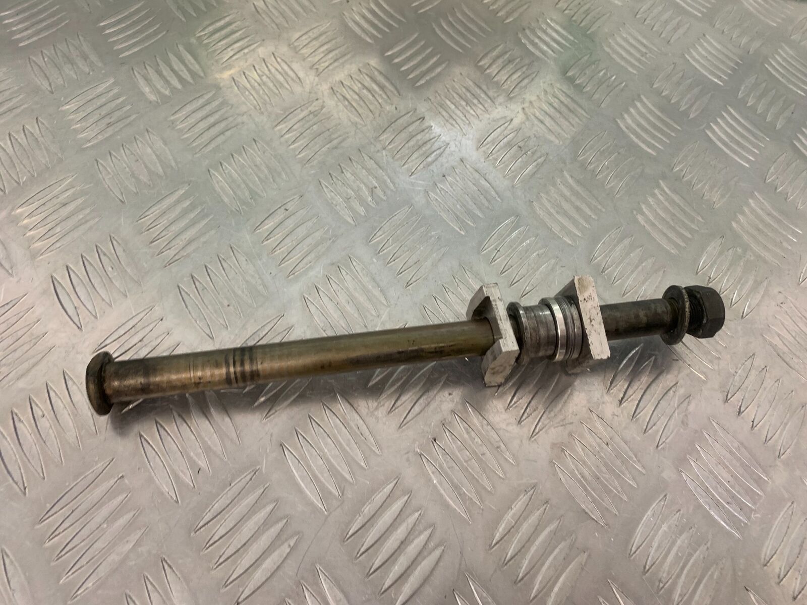 TRIUMPH 955I SPRINT RS REAR WHEEL SPINDLE YEAR 1999-04 (STOCK 989)