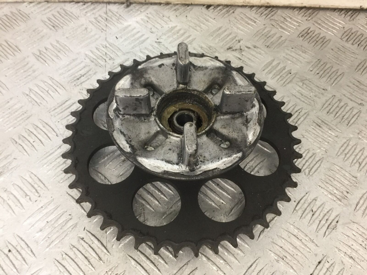 HONDA XL125 VARADERO REAR SPROCKET CARRIER  YEAR 2001-04 (STOCK 854)