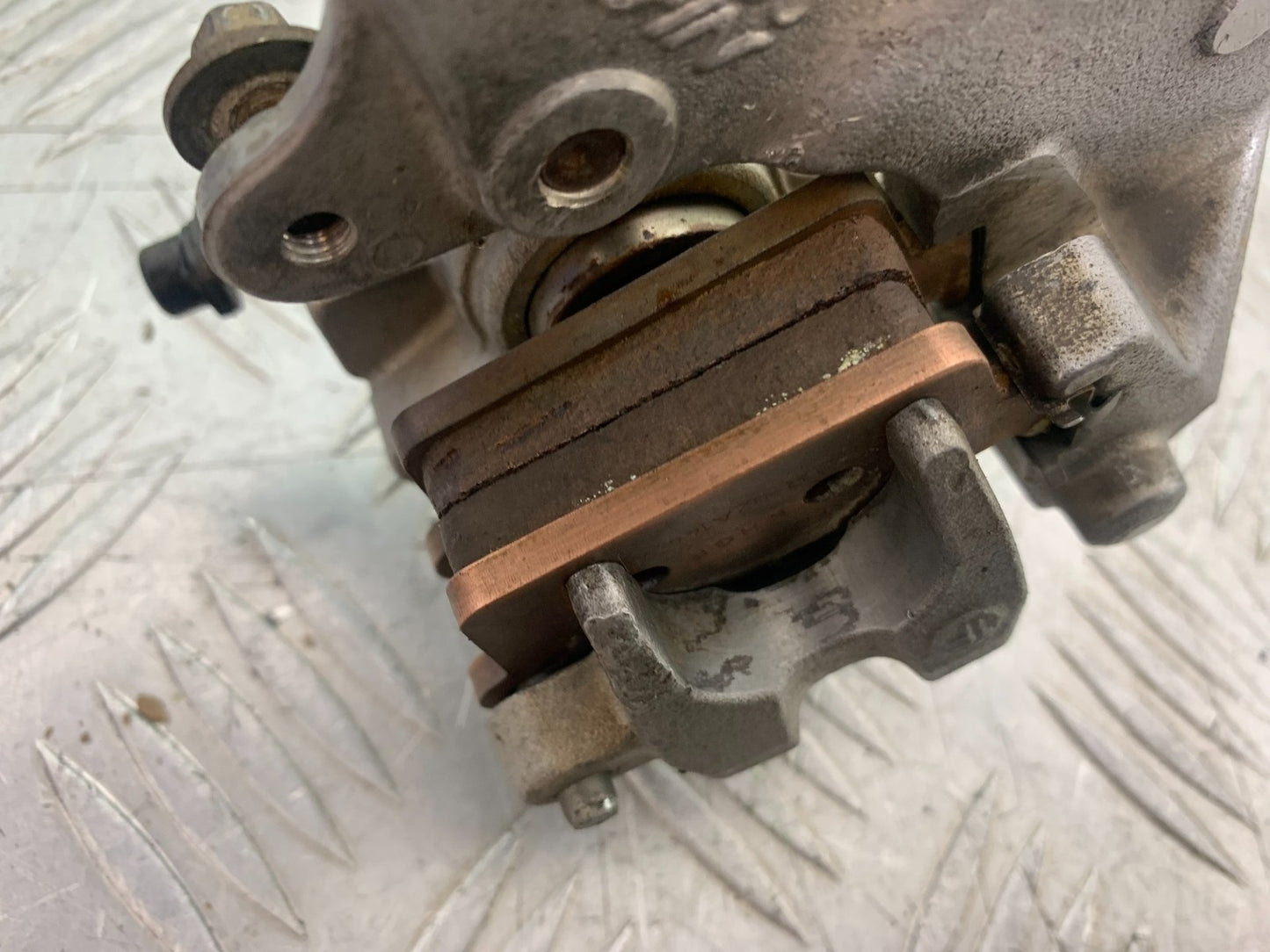 KAWASAKI KXF450 KXF 450 REAR BRAKE CALIPER AND BRACKET  YEAR 2013 CMB1217)