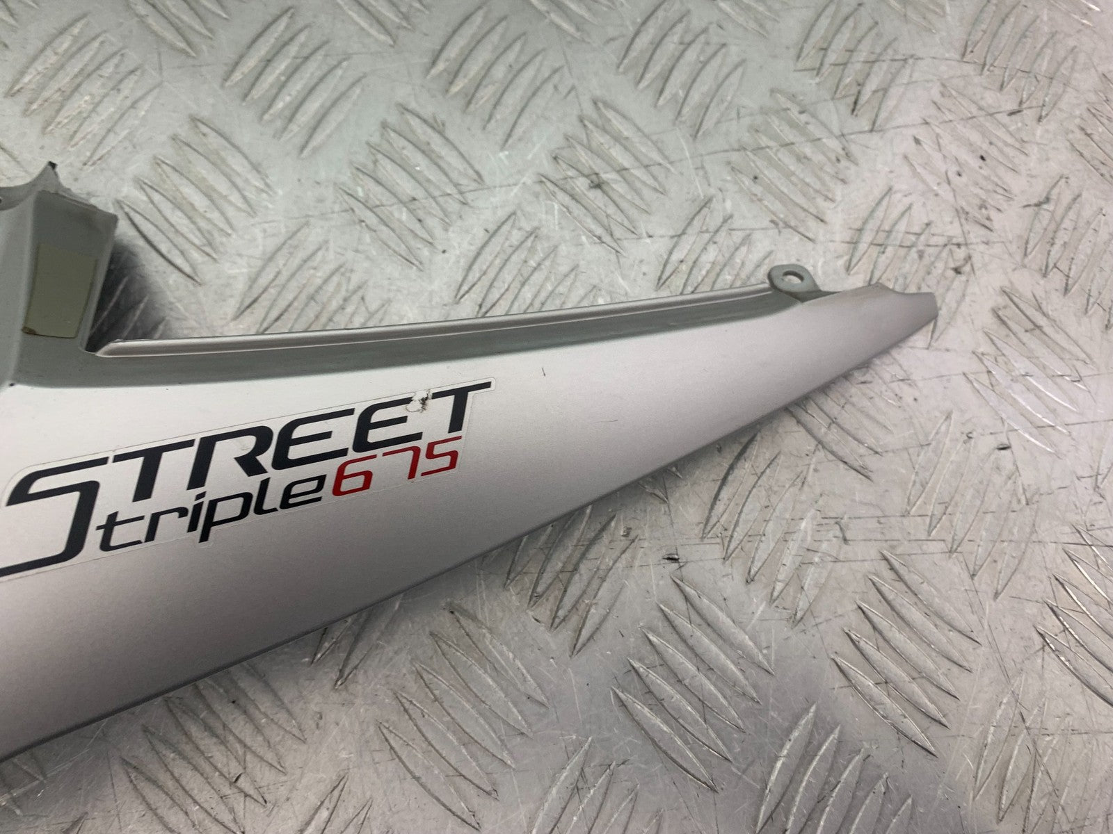 TRIUMPH 675 STREET TRIPLE RX LEFT SEAT PANEL 2015-2017 (CMB1299)