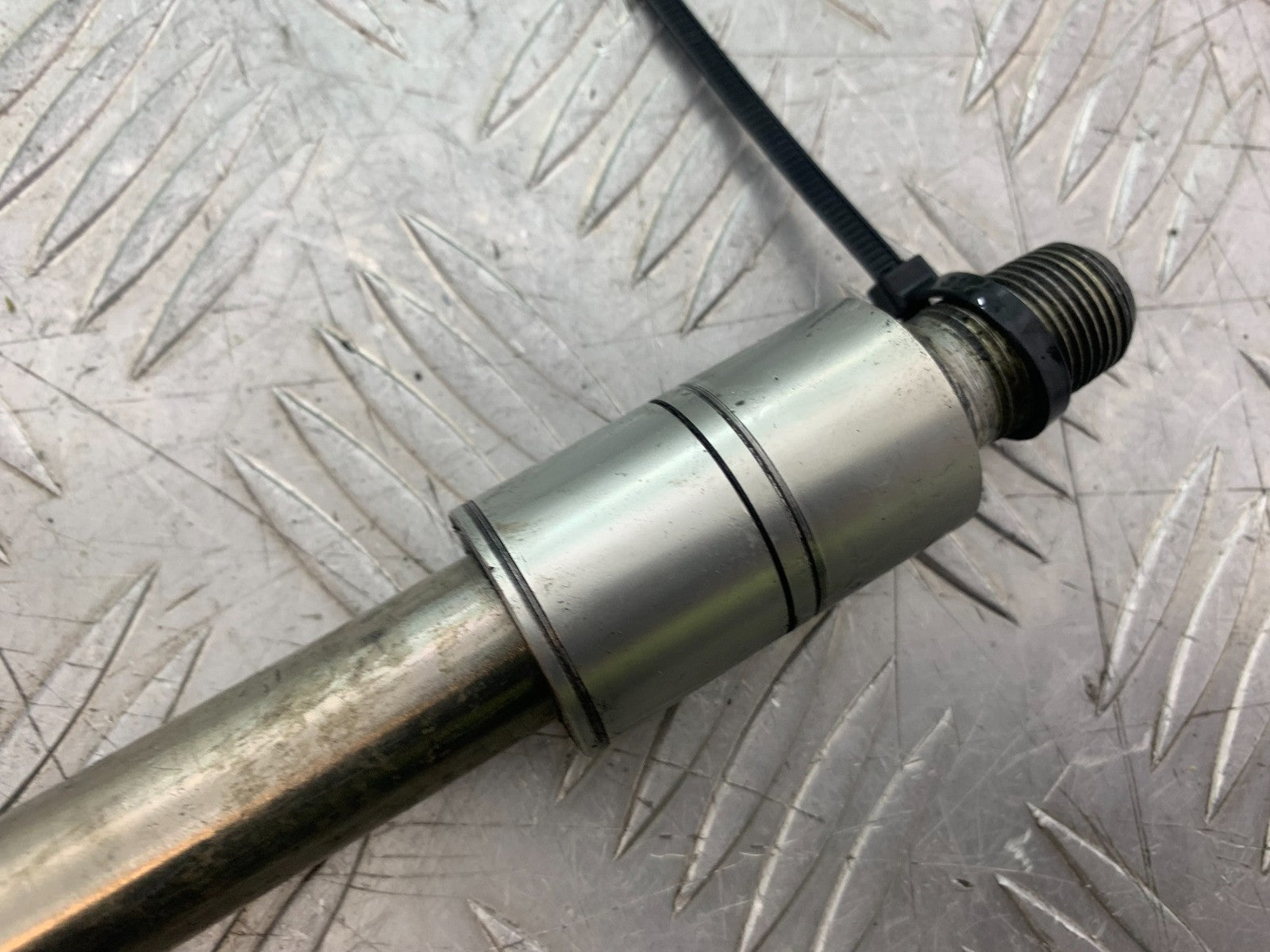 TRIUMPH 675 STREET TRIPLE R FRONT WHEEL SPINDLE    YEAR 2013 - 2016 (CMB1221)