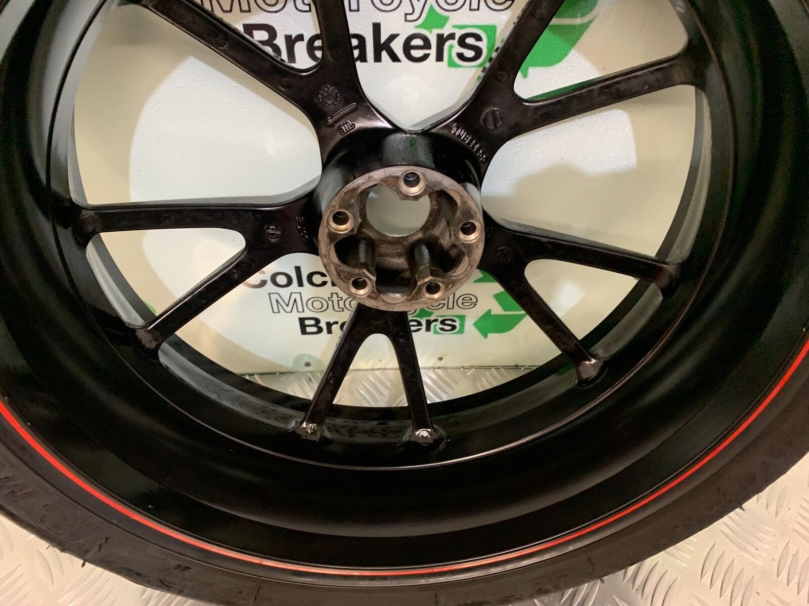 TRIUMPH SPEED TRIPLE R 1050 REAR WHEEL   YEAR 2014 (STOCK 934)