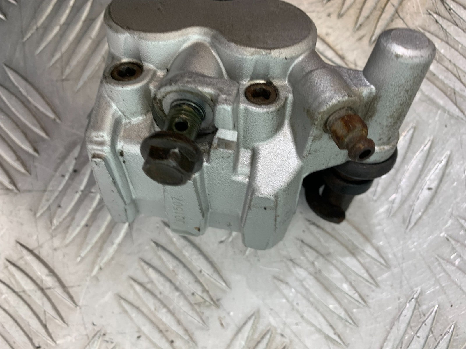 QINGQI QM125 GY-2B FRONT BRAKE CALIPER YEAR 2016 (CMB1228)
