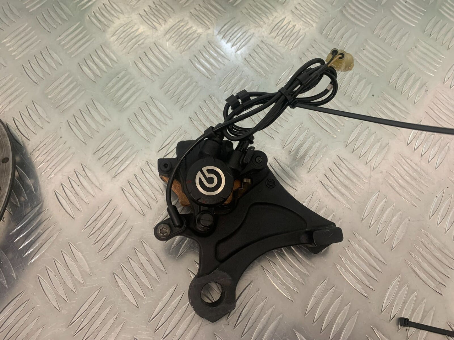 TRIUMPH 675 STREET TRIPLE RX REAR CALIPER  YEAR 2015-2017  (STOCK 971)